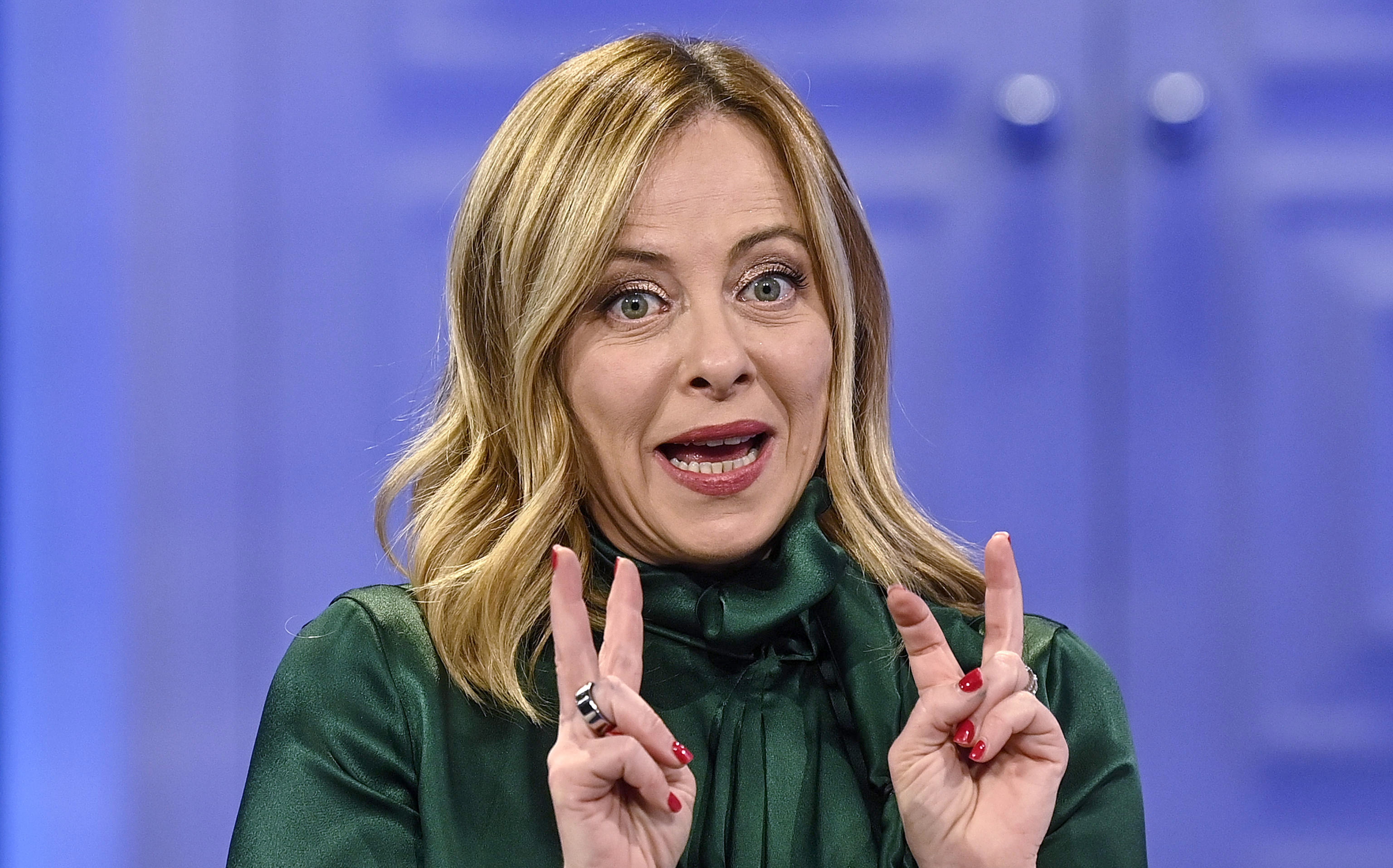 epa11002275 Italian Prime Minister Giorgia Meloni attends Raiuno's television talk show 'Porta a Porta' (lit. Door-to-door) during the special 'Mafia - The victims', in Rome, Italy, 29 November 2023.  EPA-EFE/RICCARDO ANTIMIANI