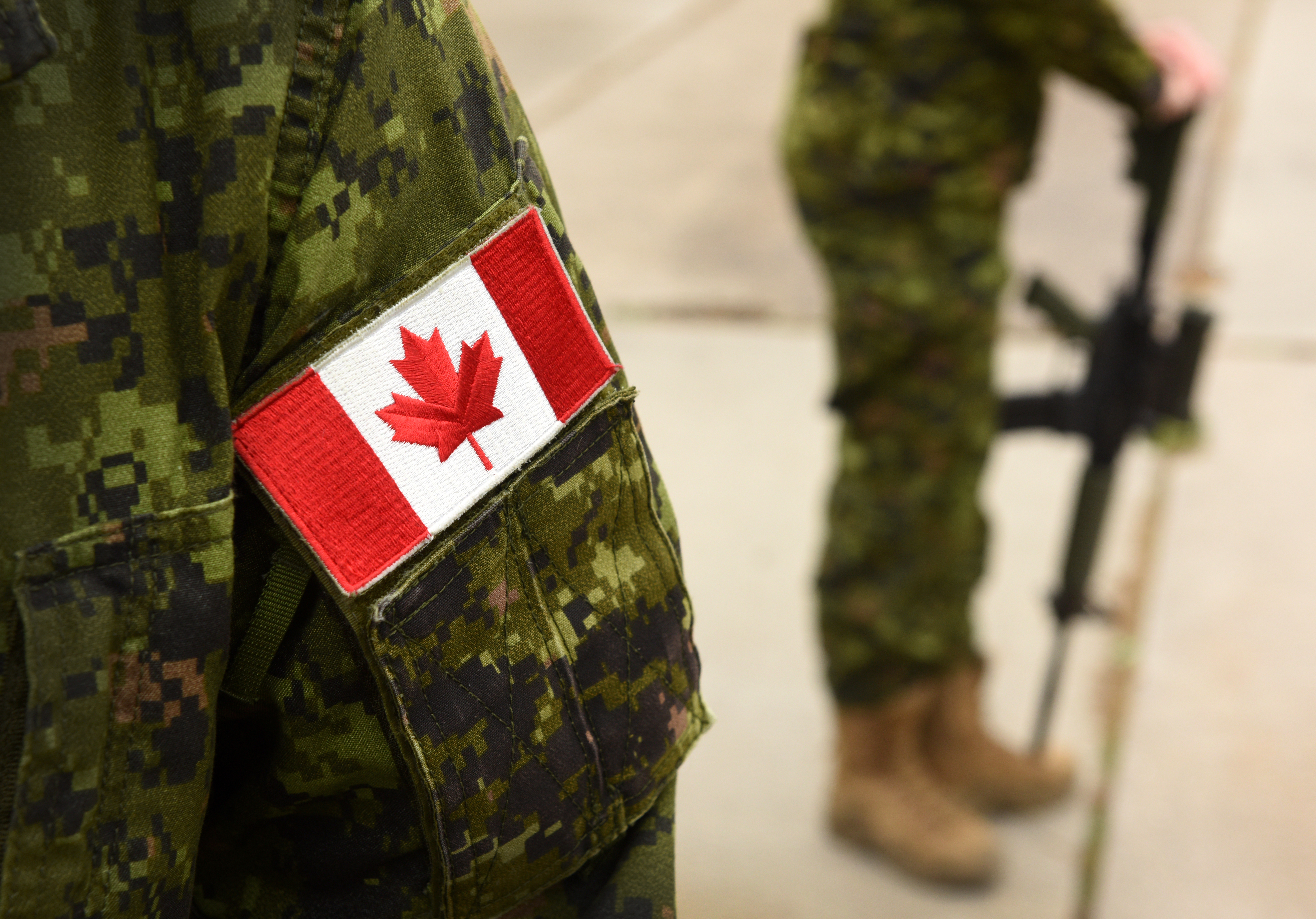 Flag,Of,Canada,On,The,Military,Uniform.,Canadian,Soldiers.,Canadian