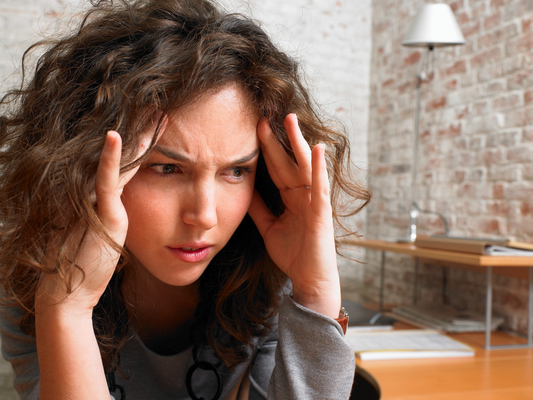 Stressed woman at desk