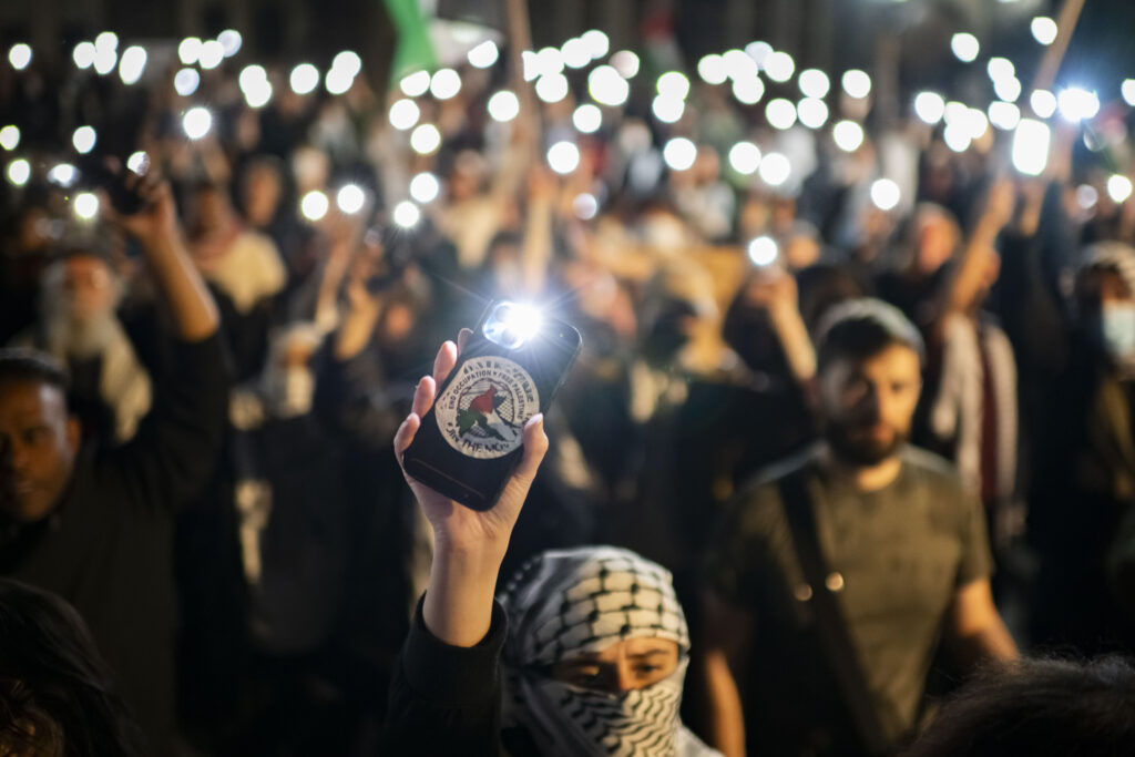 Protesters chant outside a pro-Palestinian encampment set up on the University of Toronto campus in Toronto, Thursday, May 2, 2024. (Christopher Katsarov/The Canadian Press via AP)