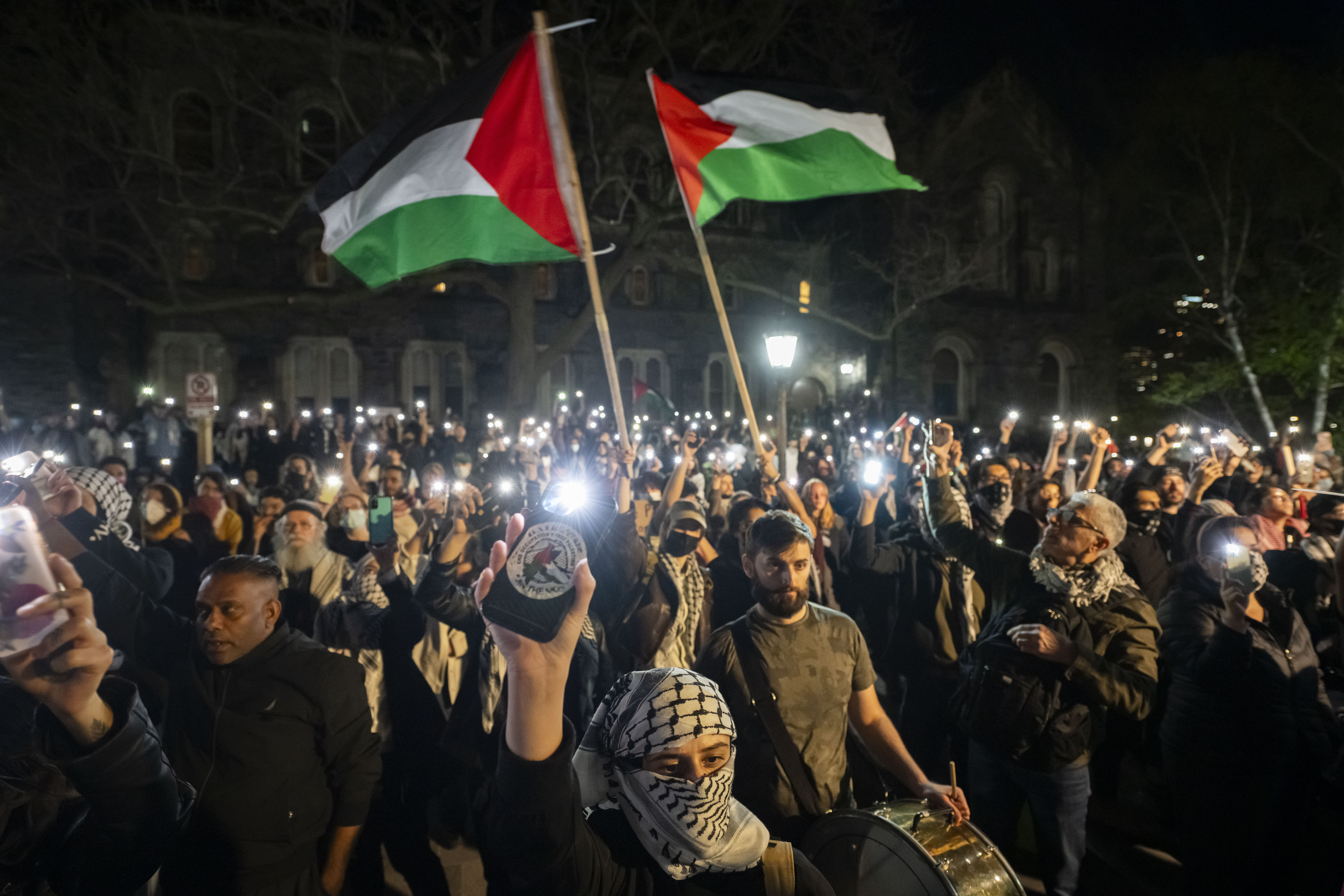 Protesters chant outside of a pro-Palestinian encampment set up on the University of Toronto campus in Toronto, Thursday, May 2, 2024. (Christopher Katsarov/The Canadian Press via AP)