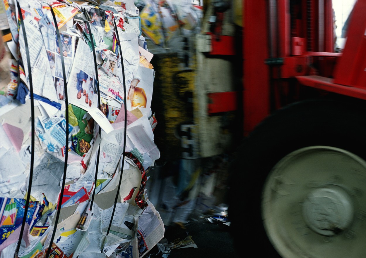 Forklift moving bales of waste paper,Image: 69884829, License: Royalty-free, Restrictions: , Model Release: no, Credit line: James Hardy / Photo Alto / Profimedia