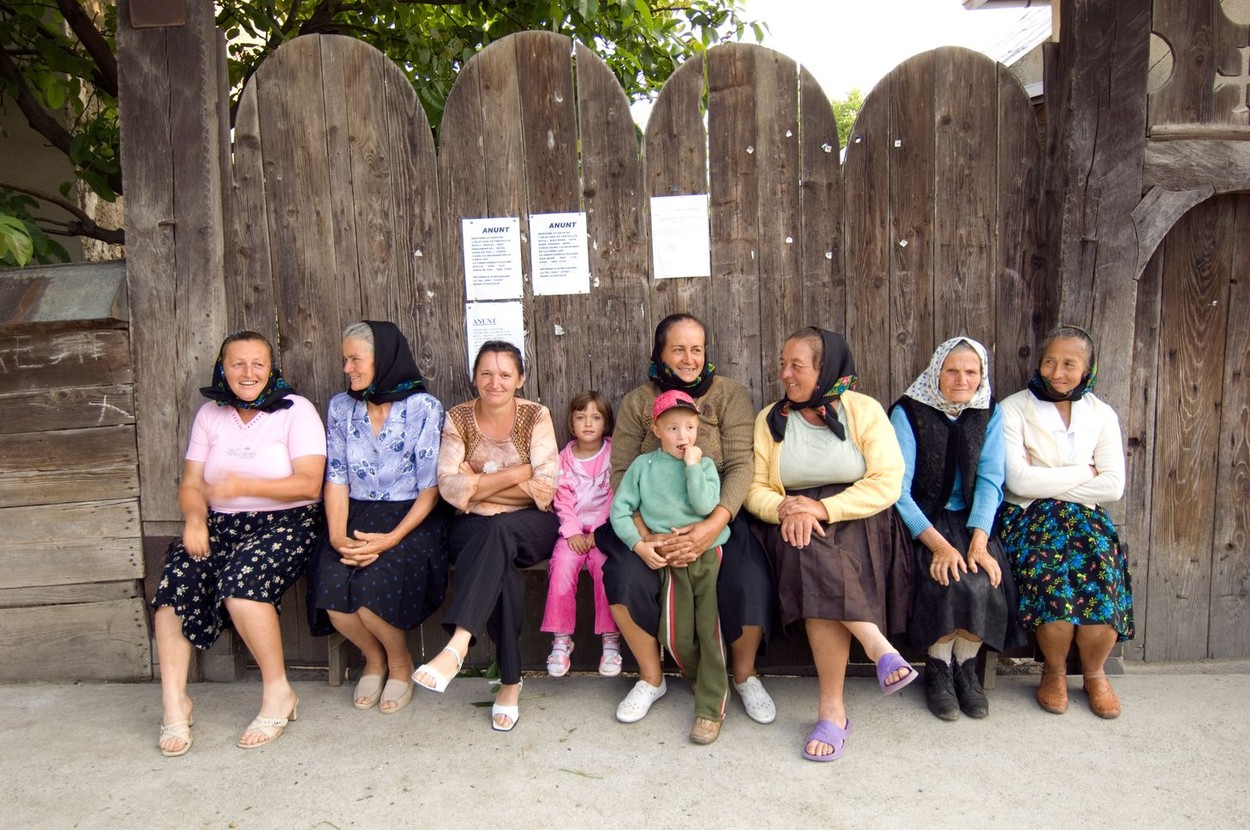 Europe Romania Maramures local women chatting in Bogdan Voda