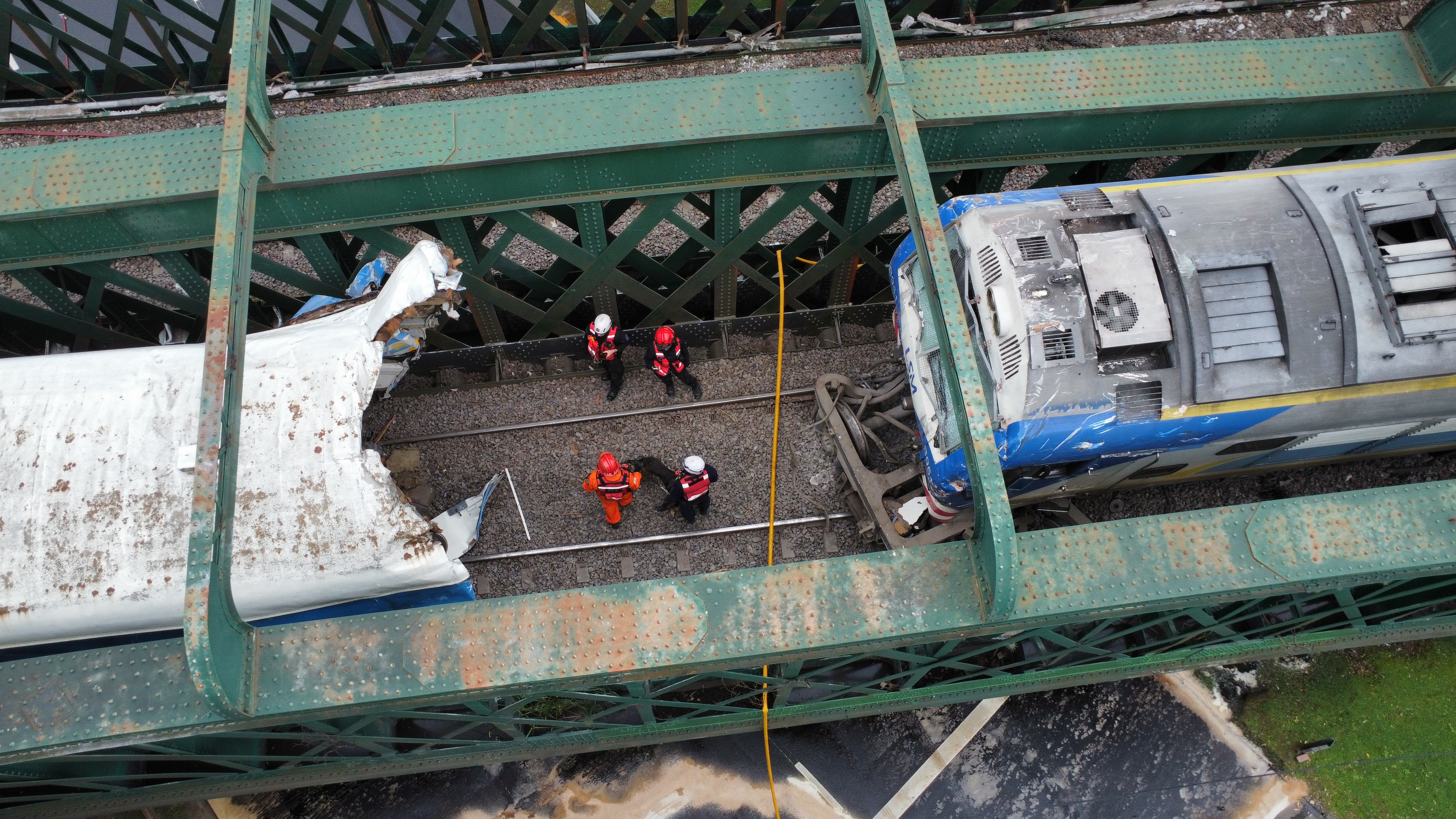 At least 60 people injured after train collides with locomotive in Buenos Aires