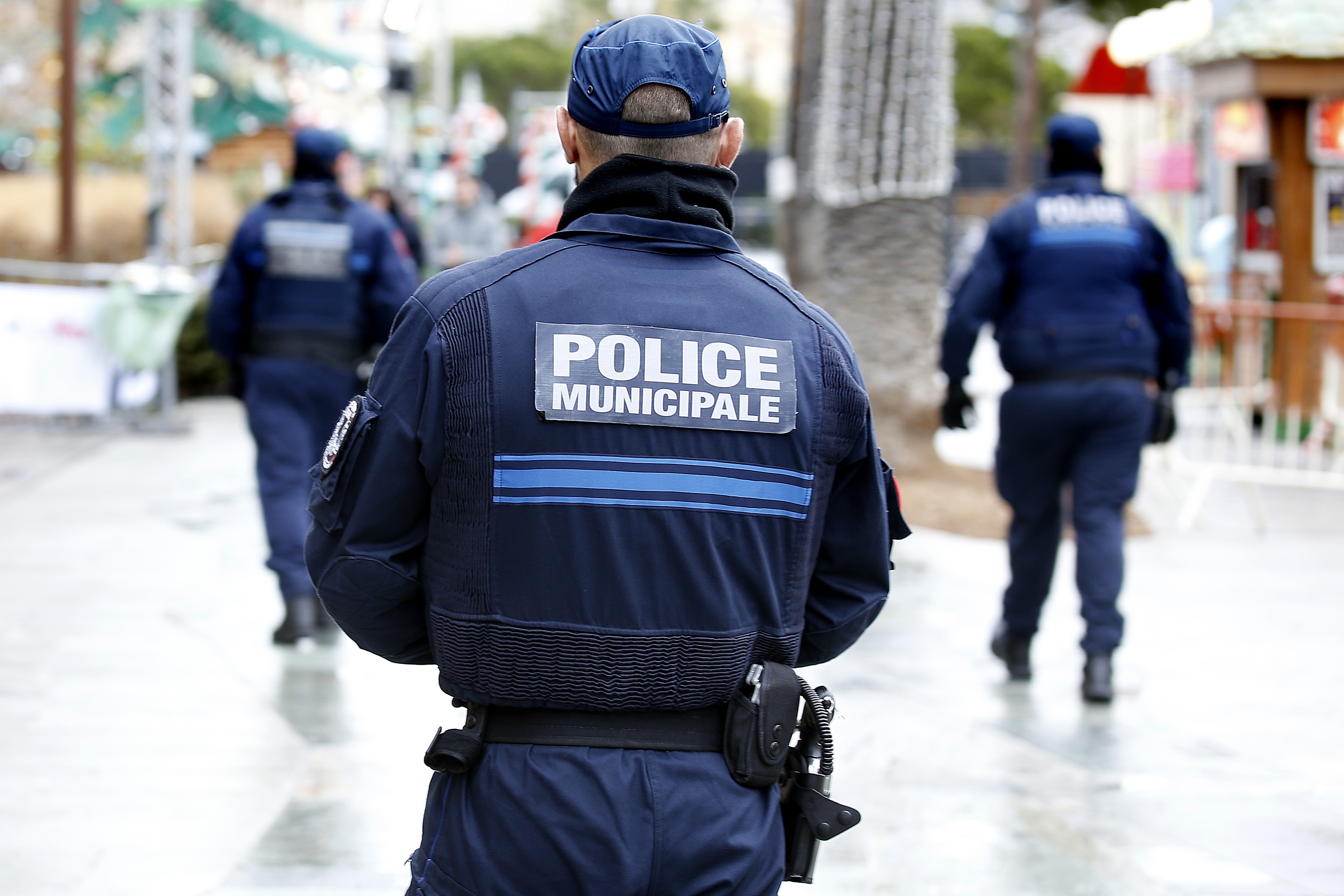 Police officers patrol the Nice Christmas market