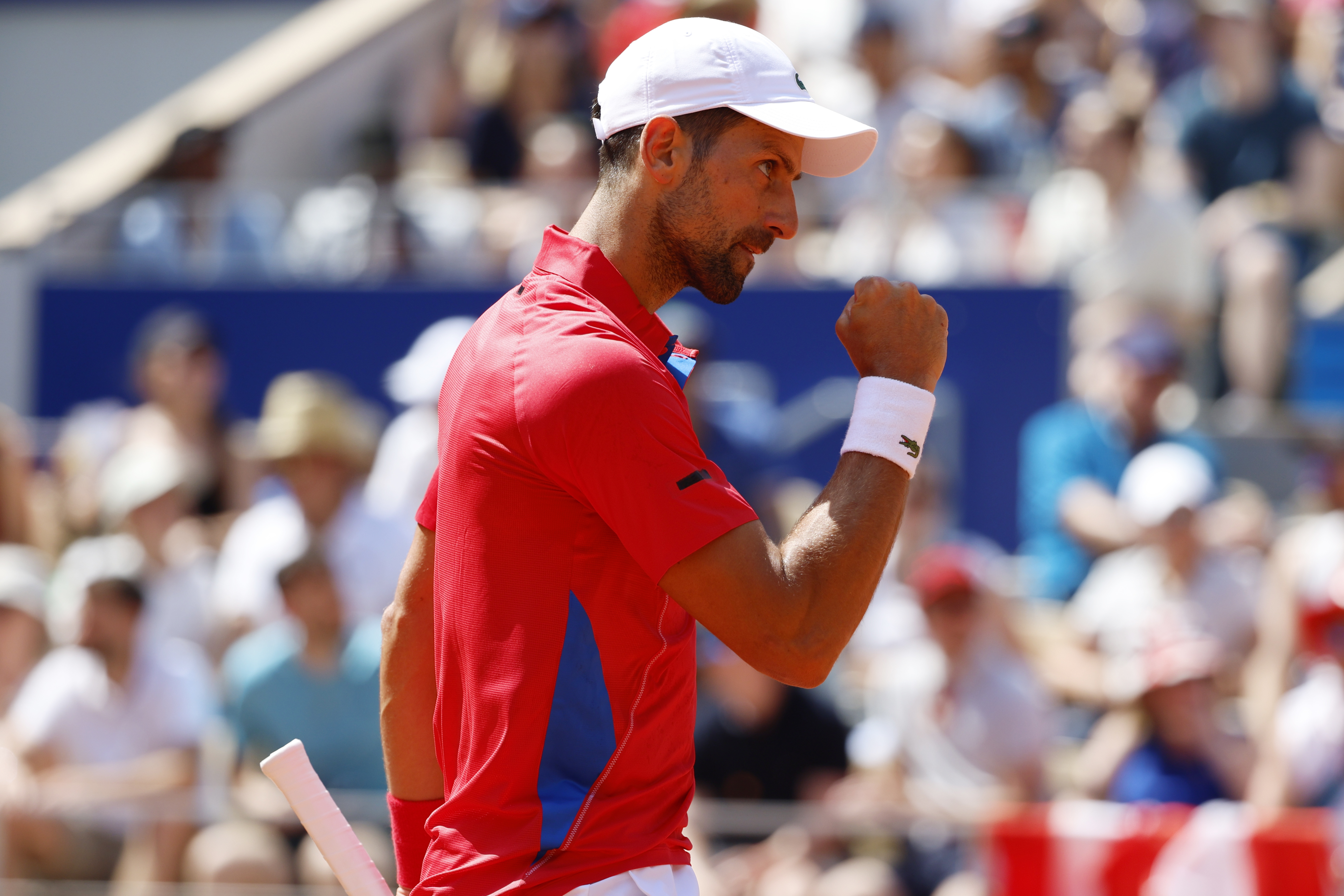 epa11505657 Novak Djokovic of Serbia reacts during the Men's Singles second round match against Rafael Nadal of Spain at the Tennis competitions in the Paris 2024 Olympic Games, at the Roland Garros in Paris, France, 29 July 2024.  EPA-EFE/FRANCK ROBICHON