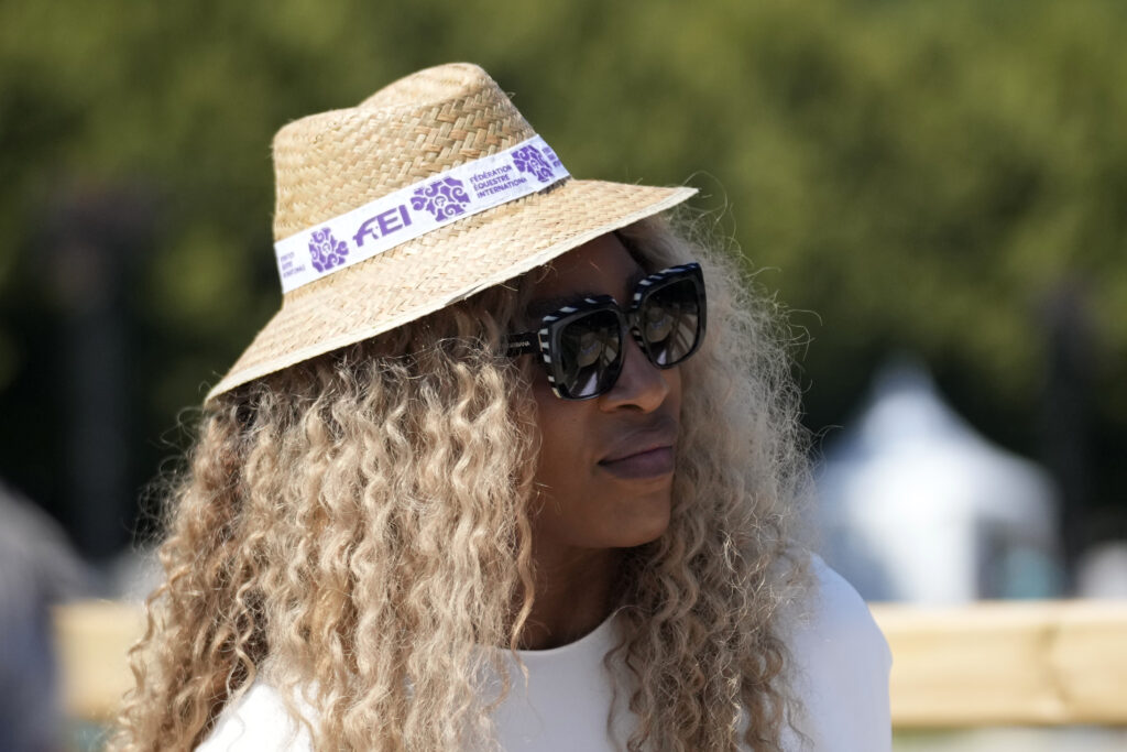 Serena Williams attends the Jumping Individual final at the 2024 Summer Olympics, Tuesday, Aug. 6, 2024, in Versailles, France. (AP Photo/Mosa'ab Elshamy)
