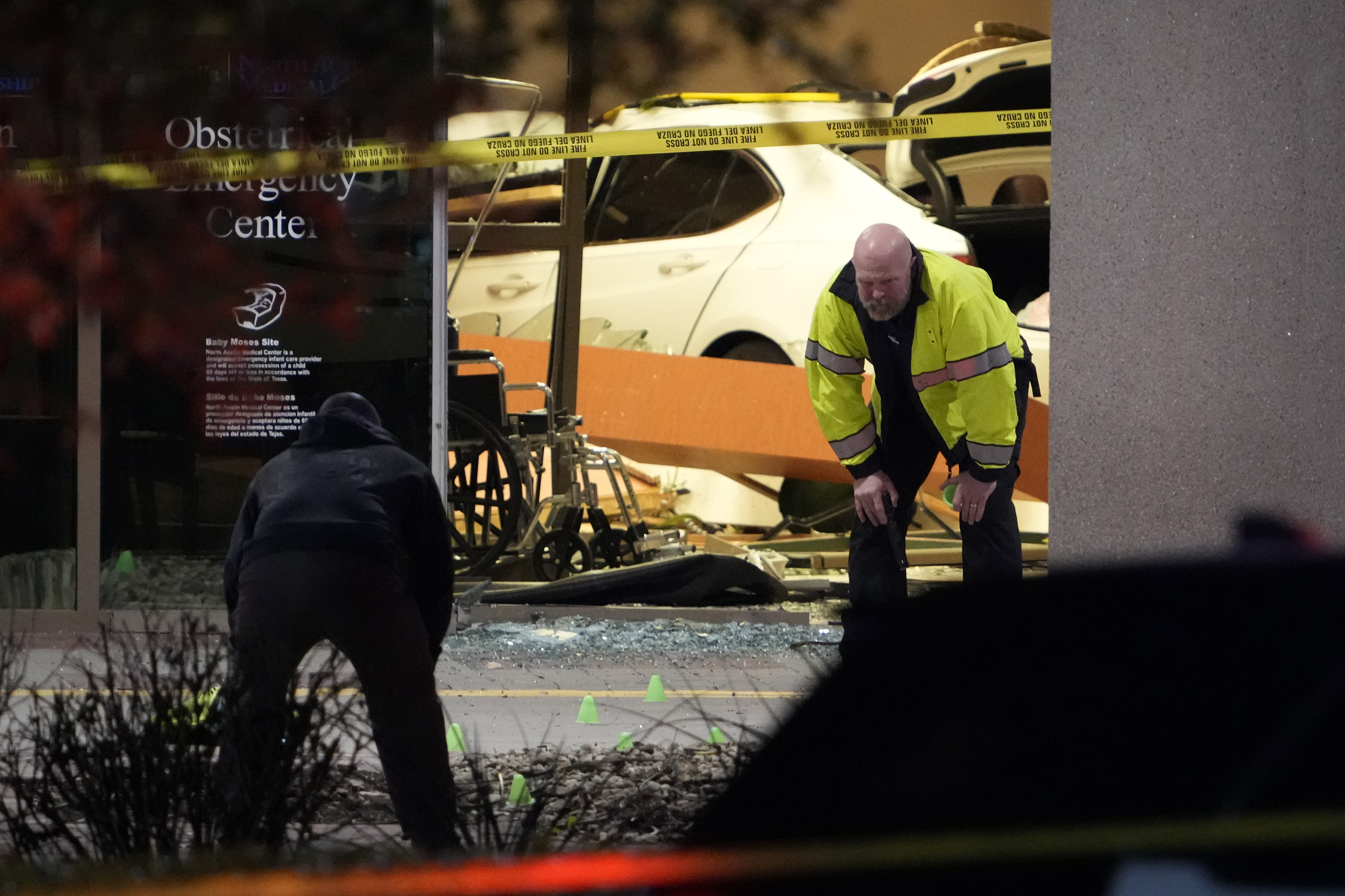 Police investigate after a car crashed into an emergency room at St. David's North Austin Medical Center Medical Center, Tuesday, Feb. 13, 2024, in Austin. (Jay Janner/Austin American-Statesman via AP)