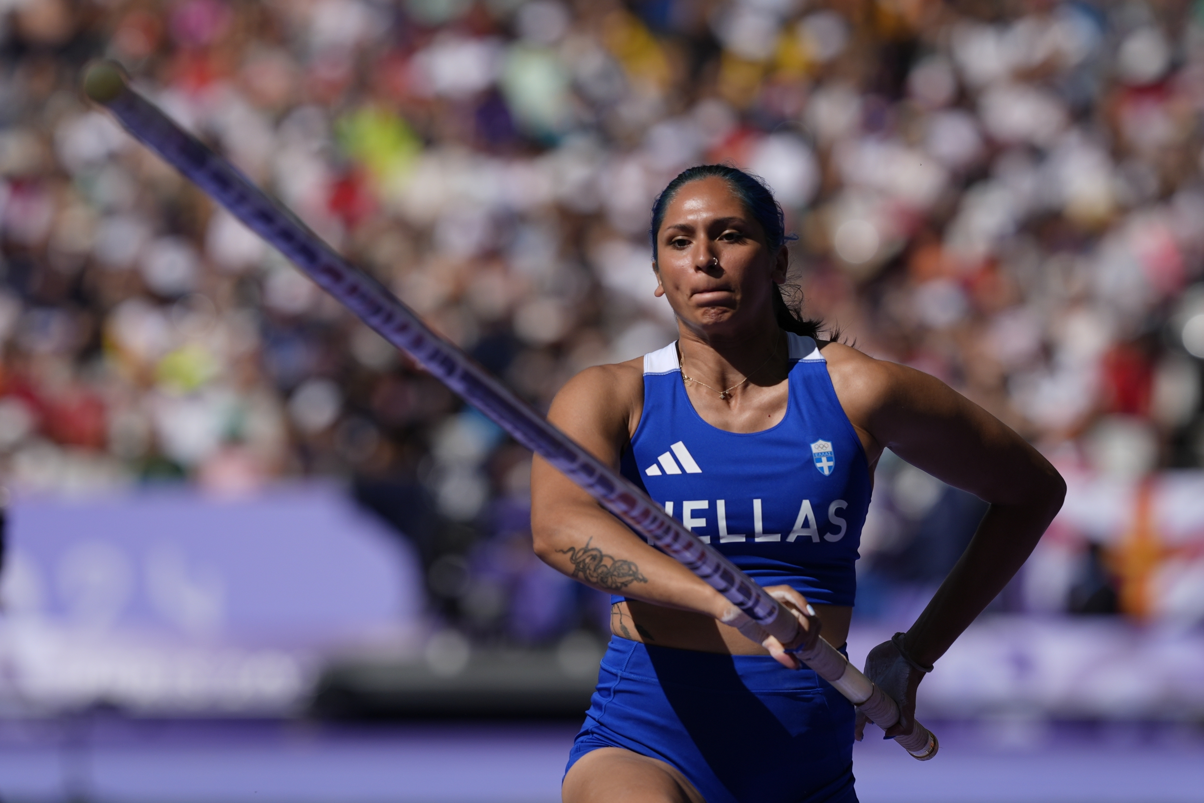 Eleni-Klaoudia Polak, of Greece, competes during the women's pole vault qualification at the 2024 Summer Olympics, Monday, Aug. 5, 2024, in Saint-Denis, France. (AP Photo/Matthias Schrader)