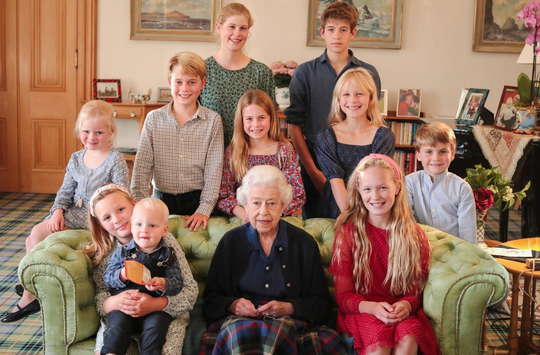 The late Queen Elizabeth II and her Grandchildren.
