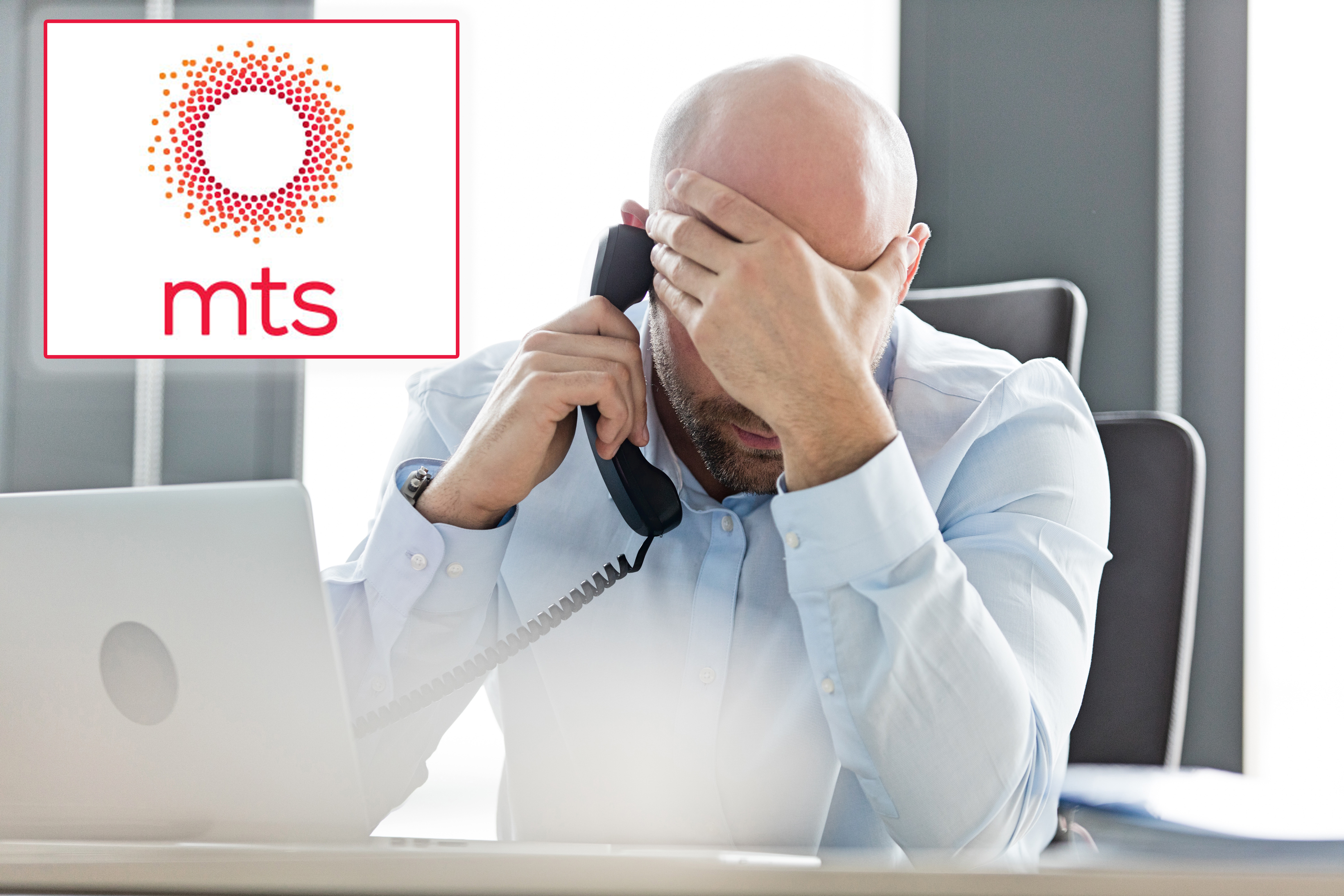 zabrinuti covek fiksni telefon mts Tired mid adult businessman using landline phone at desk in office