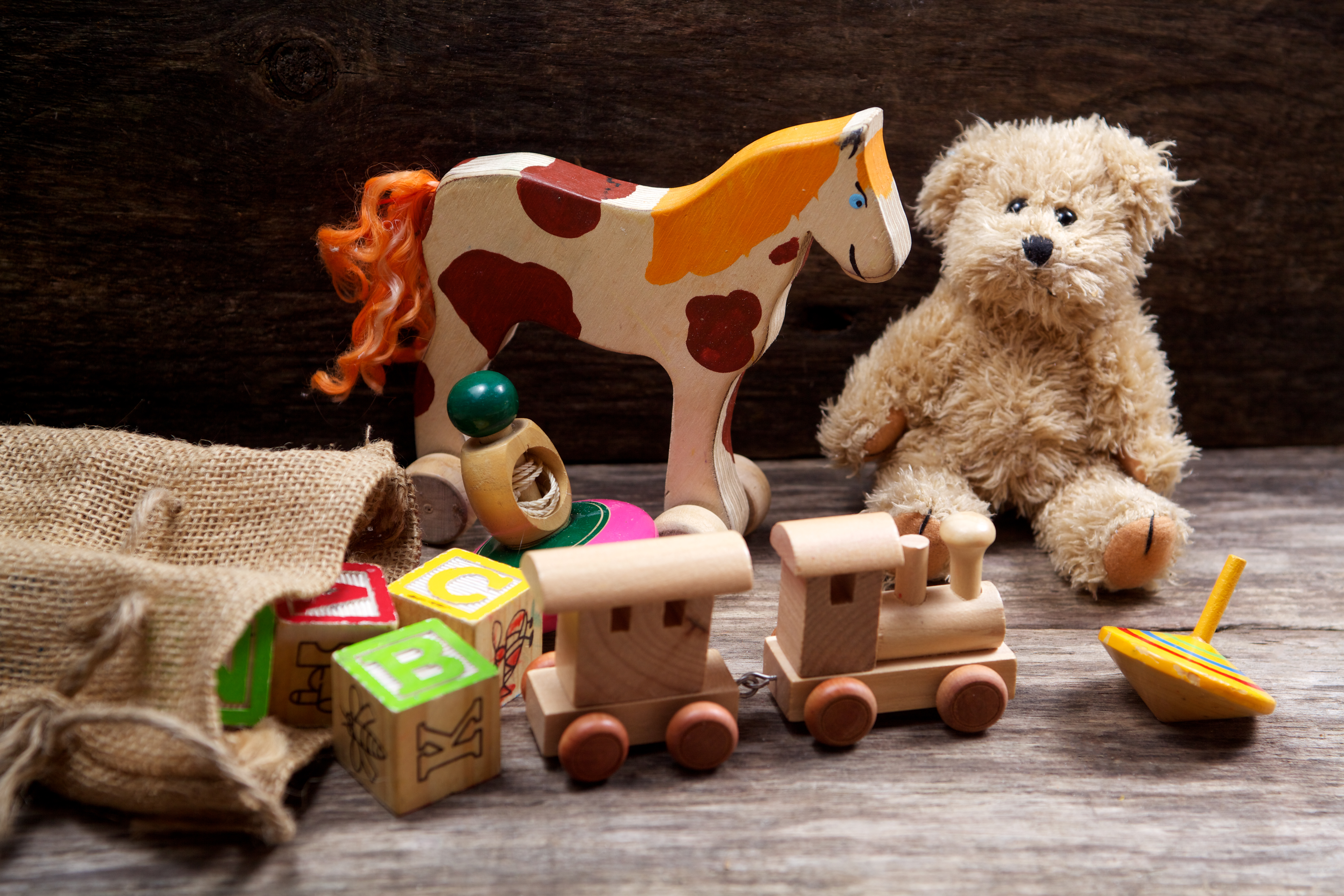 Vintage,Toys,On,Wooden,Background