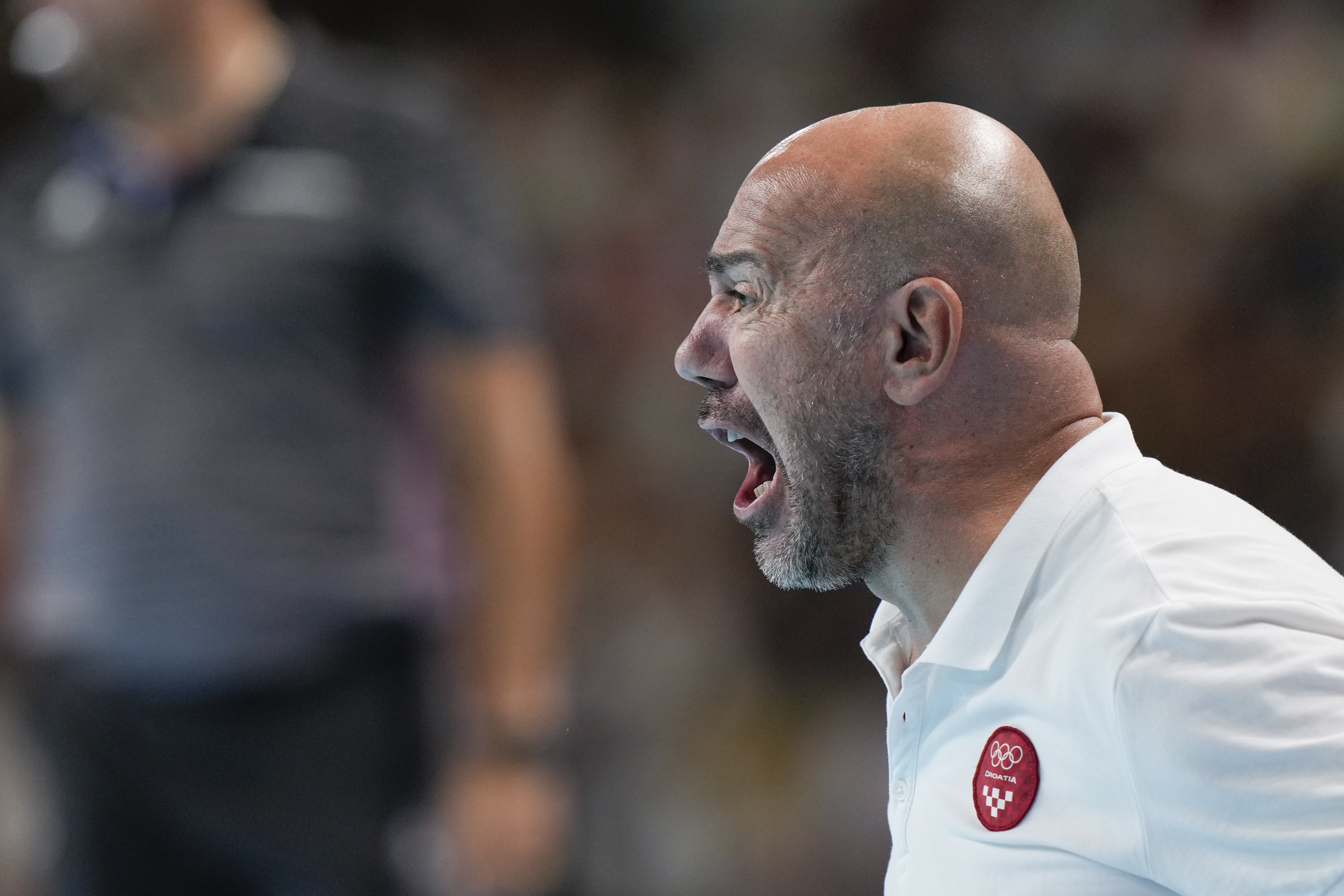 Croatia's head coach Ivica Tucak reacts during the men's water polo gold medal match between Serbia and Croatia, at the 2024 Summer Olympics, Sunday, Aug. 11, 2024, in Paris, France. (AP Photo/Luca Bruno)