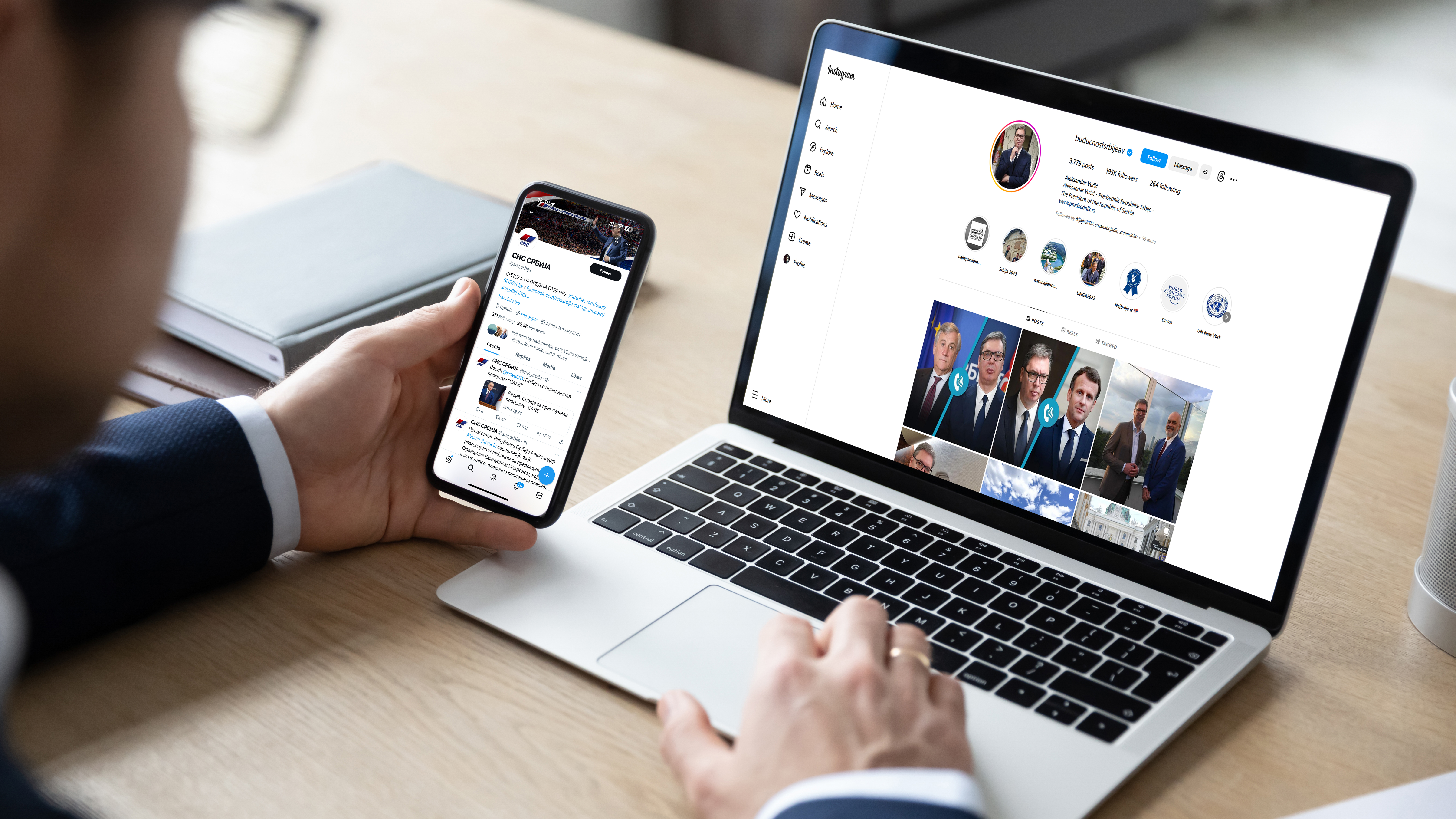 Close up back view of male employer sit at desk using modern laptop and smartphone gadget, businessman consult client work on computer and cellphone device at workplace, white mockup screen sns botovi