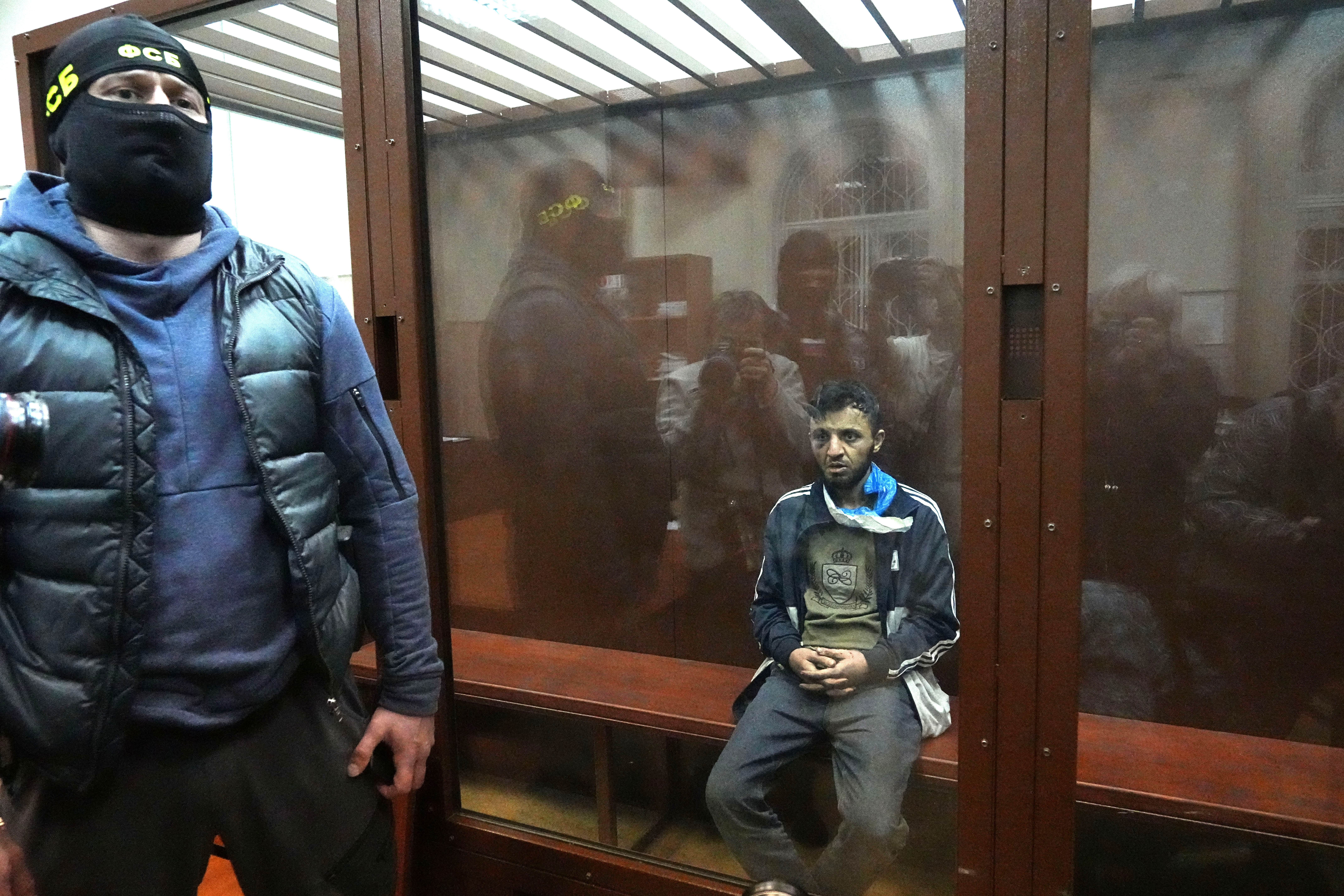 Suspect in the Crocus City Hall shooting on Friday sits in a courtroom in the Basmanny District Court in Moscow, Russia, Sunday, March 24, 2024. (AP Photo/Alexander Zemlianichenko)