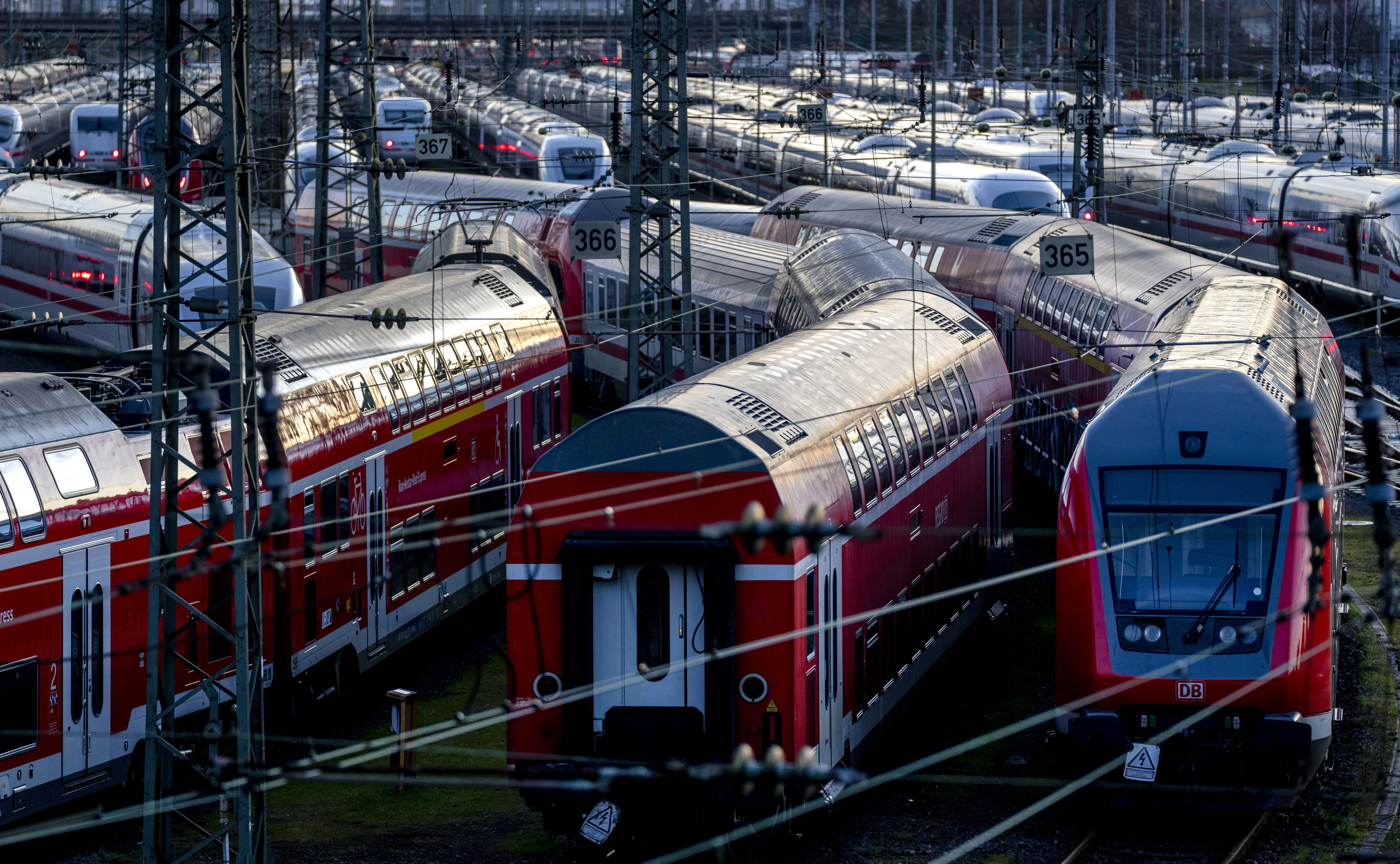 Trains are parked near the central train station in Frankfurt, Germany, Monday, March 27, 2023. Germany faces a nationwide public transport strike on Monday. (AP Photo/Michael Probst)