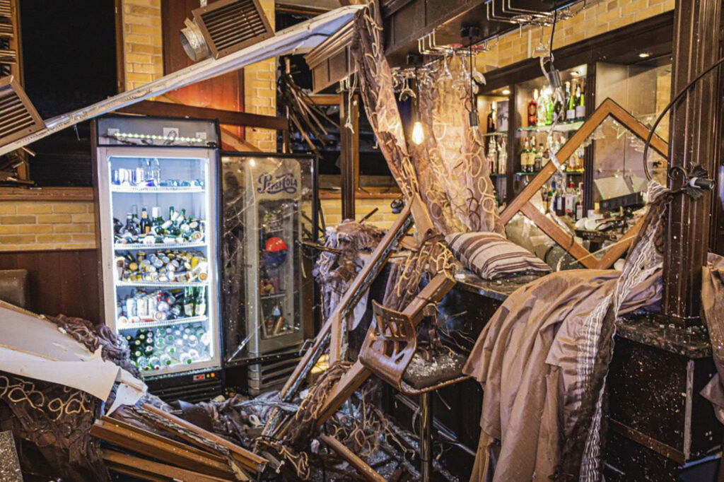 In this photo provided by the Ukrainian Emergency Service, a damaged hotel lobby is seen after Russian rocket attack in Kharkiv, Ukraine, late Wednesday, Jan. 10, 2024. (Ukrainian Emergency Service via AP)