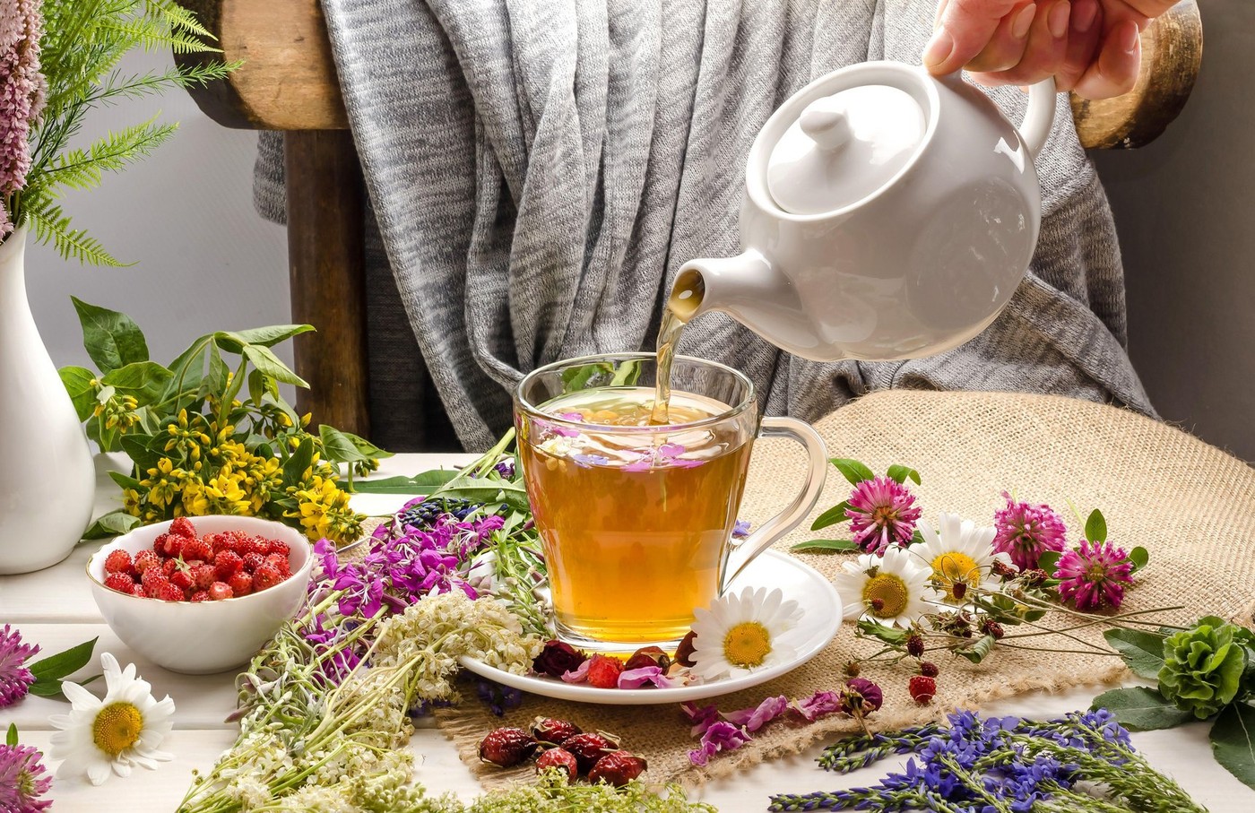 A woman pours herbal tea with chamomile, rosehip, clover. Tea ceremony. Blooming Sally.,Image: 539402956, License: Royalty-free, Restrictions: , Model Release: no, Credit line: Victoria Sennikova / Alamy / Alamy / Profimedia