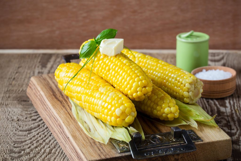 Homemade boiled corn on cob with butter and salt on rustic wooden table,Image: 296291573, License: Royalty-free, Restrictions: , Model Release: no, Credit line: istetiana / Alamy / Alamy / Profimedia