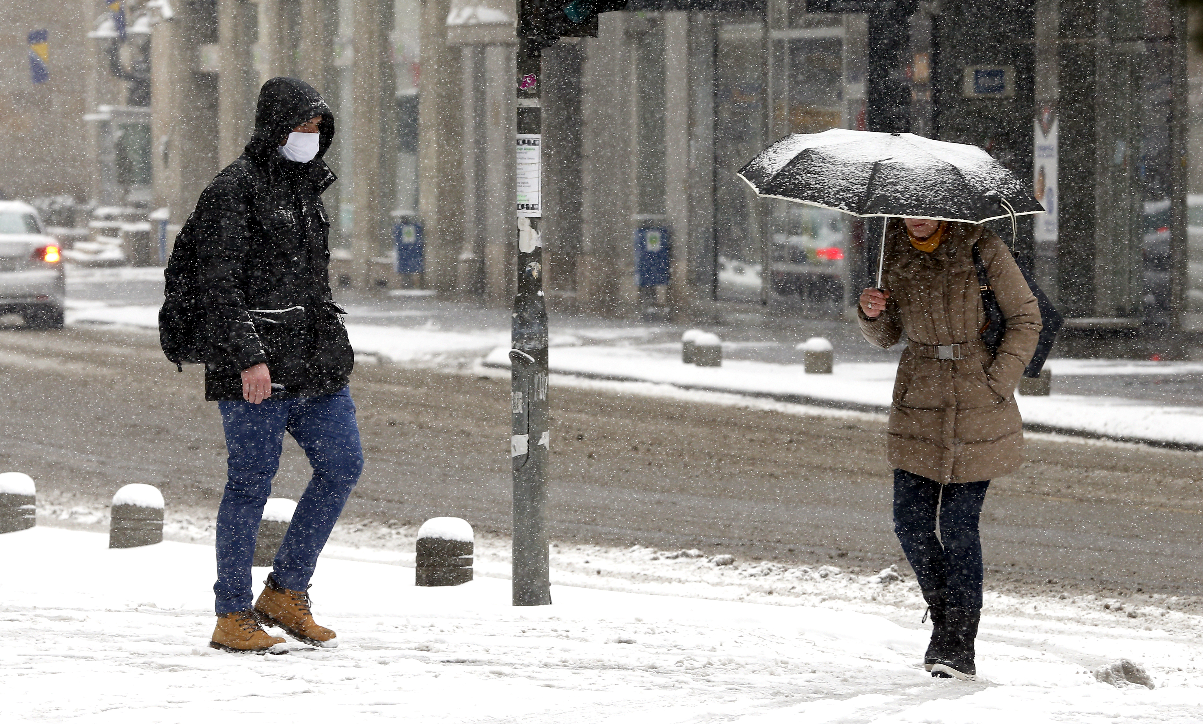 Coronavirus in Sarajevo as snow falls