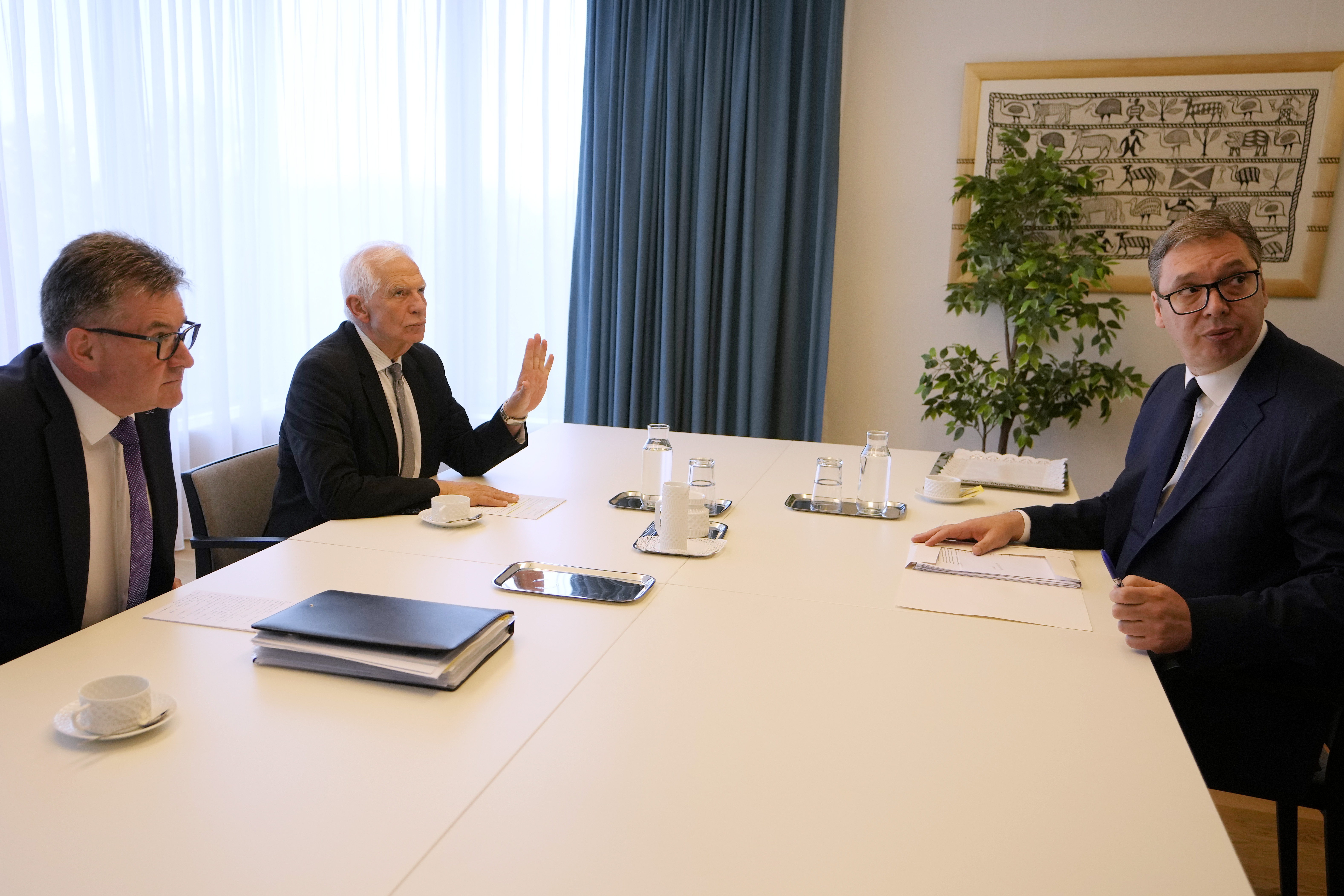 European Union foreign policy chief Josep Borrell, second left, and Serbia's President Aleksander Vucic, right, prior to talks on Serbia-Kosovo in Brussels, Wednesday, June 26, 2024. (AP Photo/Virginia Mayo)