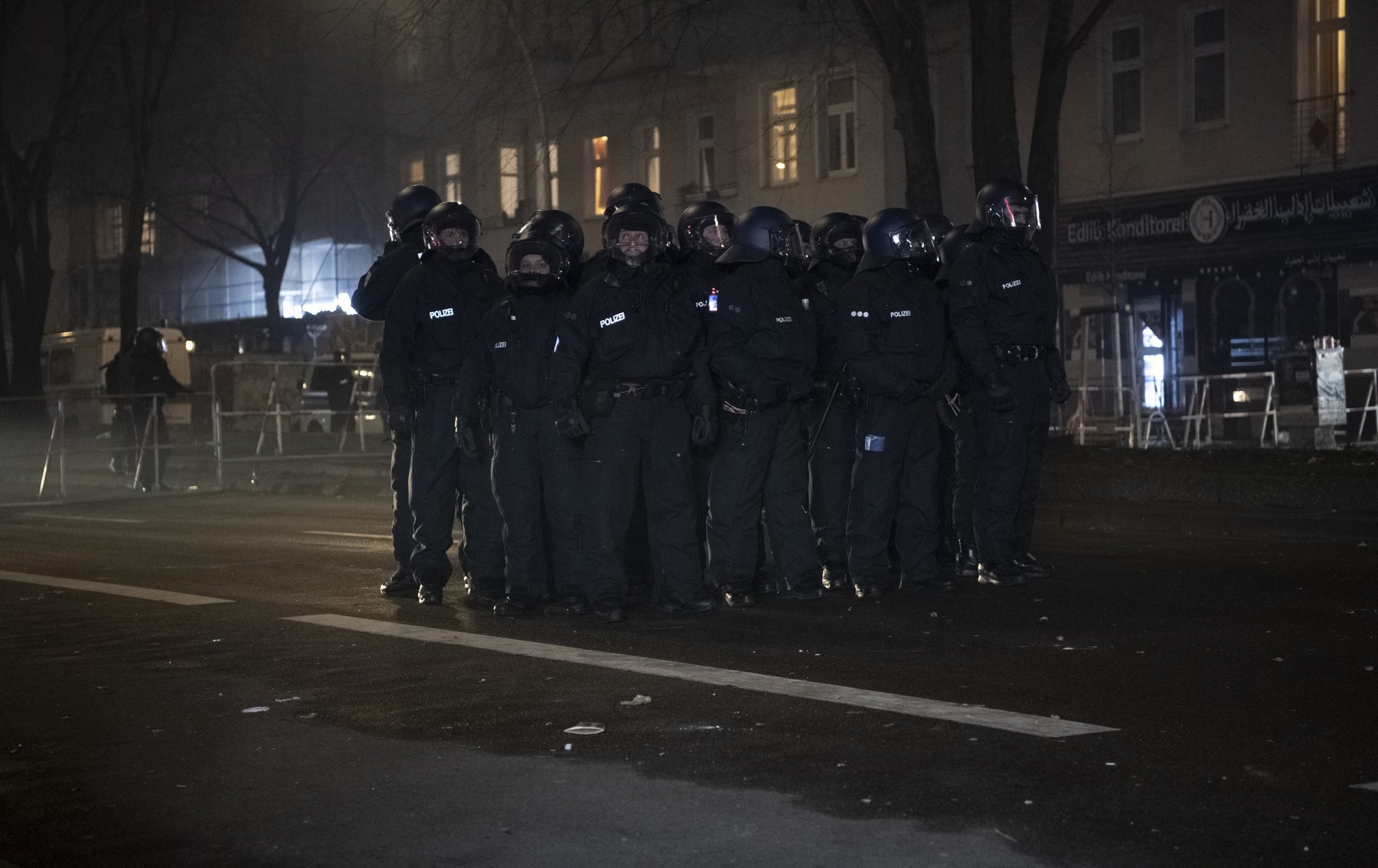 01 January 2024, Berlin: Police officers stand on Sonnenallee. Photo: Paul Zinken/dpa,Image: 833503876, License: Rights-managed, Restrictions: GERMANY OUT, Model Release: no, Credit line: Paul Zinken / AFP / Profimedia