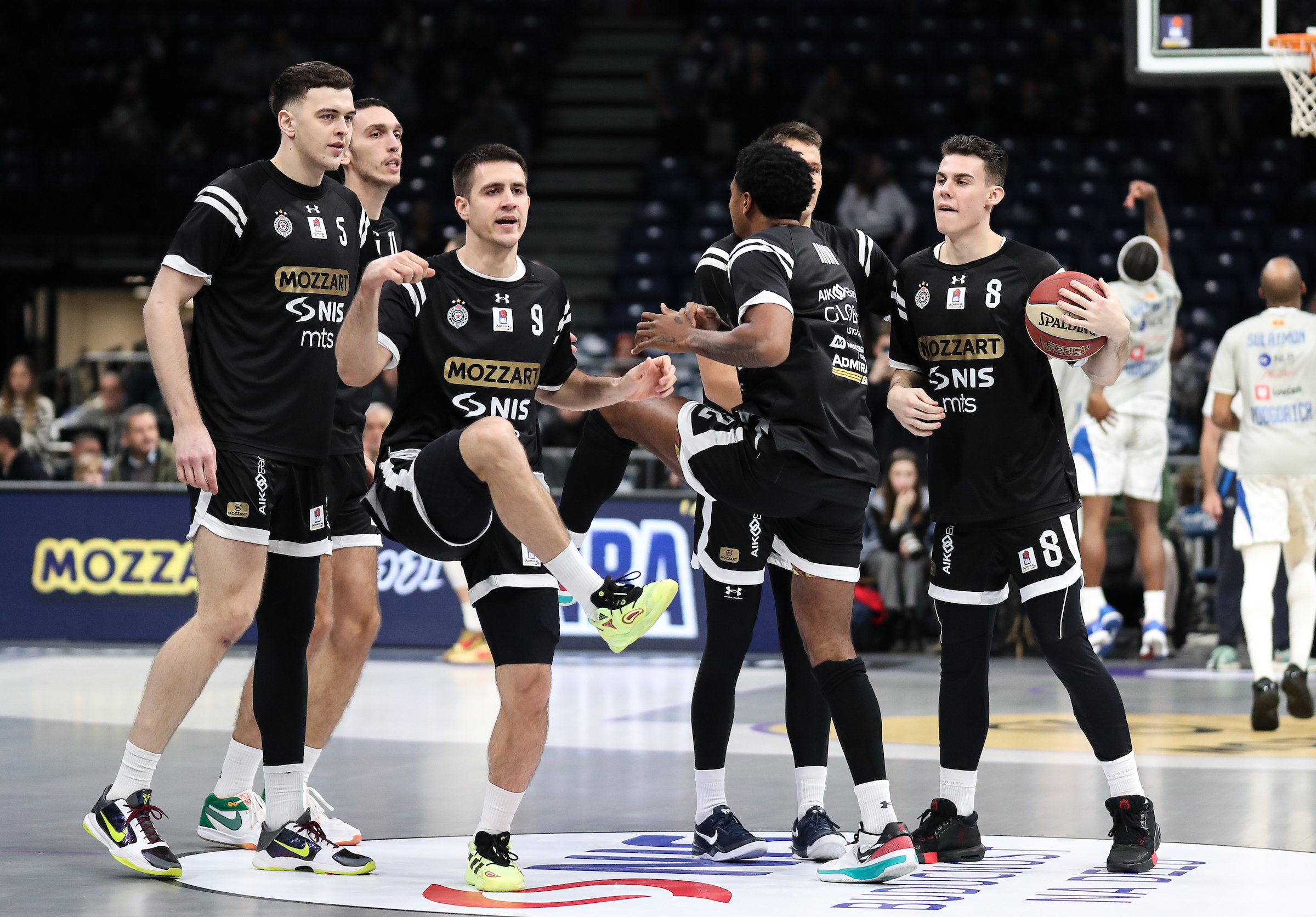 Partizan players huddle before the round 12 AdmiralBet ABA League basketball match between Partizan Mozzart Bet Belgrade and Buducnost Voli at Belgrade Arena (Beogradska Arena) on December 15, 2024 in Belgrade, Serbia. (Photo by Andrija Sokovic/Starsport)