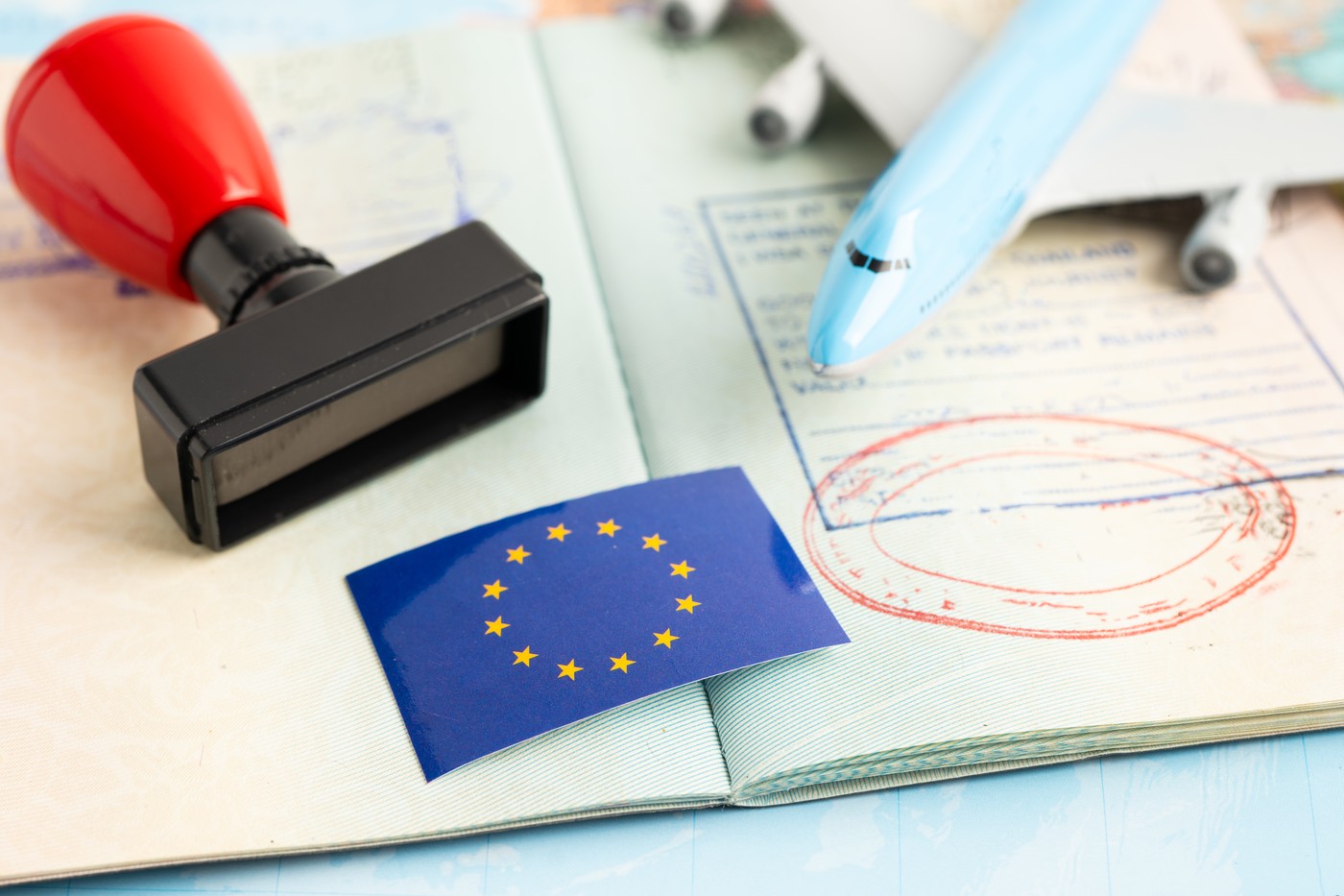Eu flag with approved Stamp visa and passport document to immigration at airport in country.,Image: 899065233, License: Royalty-free, Restrictions: , Model Release: no, Credit line: Pakawadee Wongjinda / Panthermedia / Profimedia