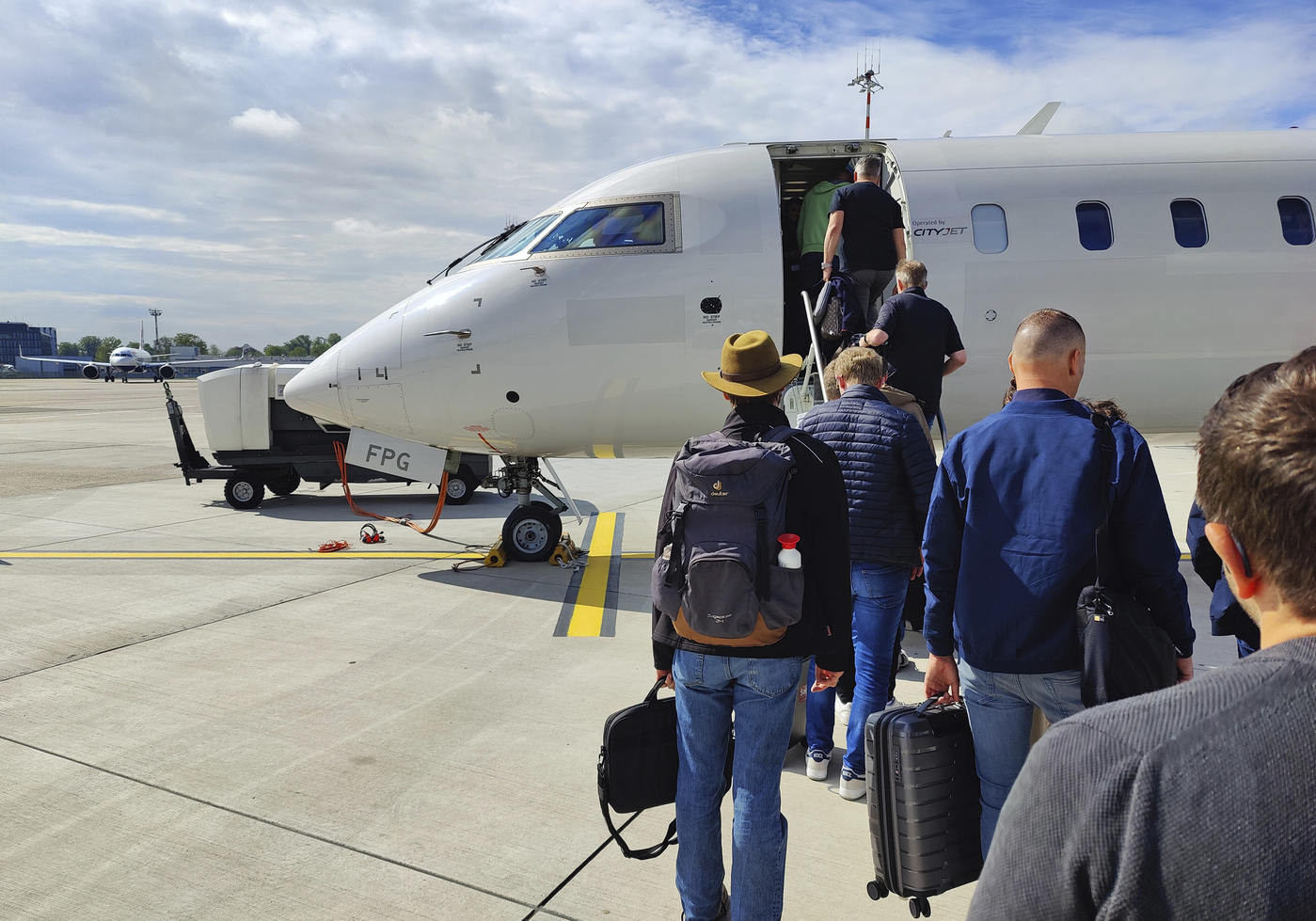 Passengers with hand luggage boarding a small aircraft on the tarmac, Düsseldorf Airport, North Rhine-Westphalia, Germany,Image: 846389370, License: Rights-managed, Restrictions: , Model Release: no, Credit line: Stefan Ziese / imageBROKER / Profimedia