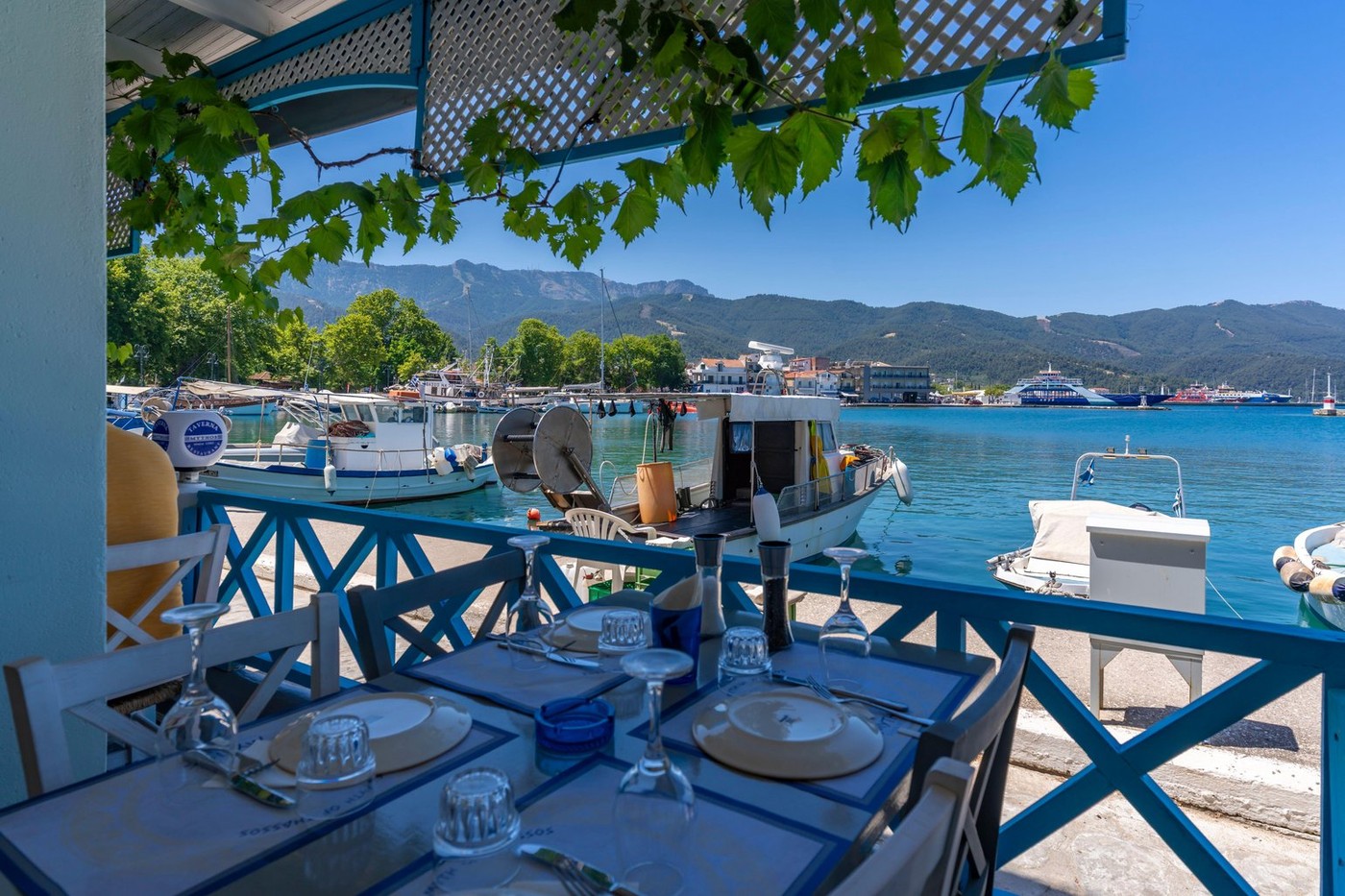 View of restaurant and harbour in Thassos Town, Thassos, Aegean Sea, Greek Islands, Greece, Europe