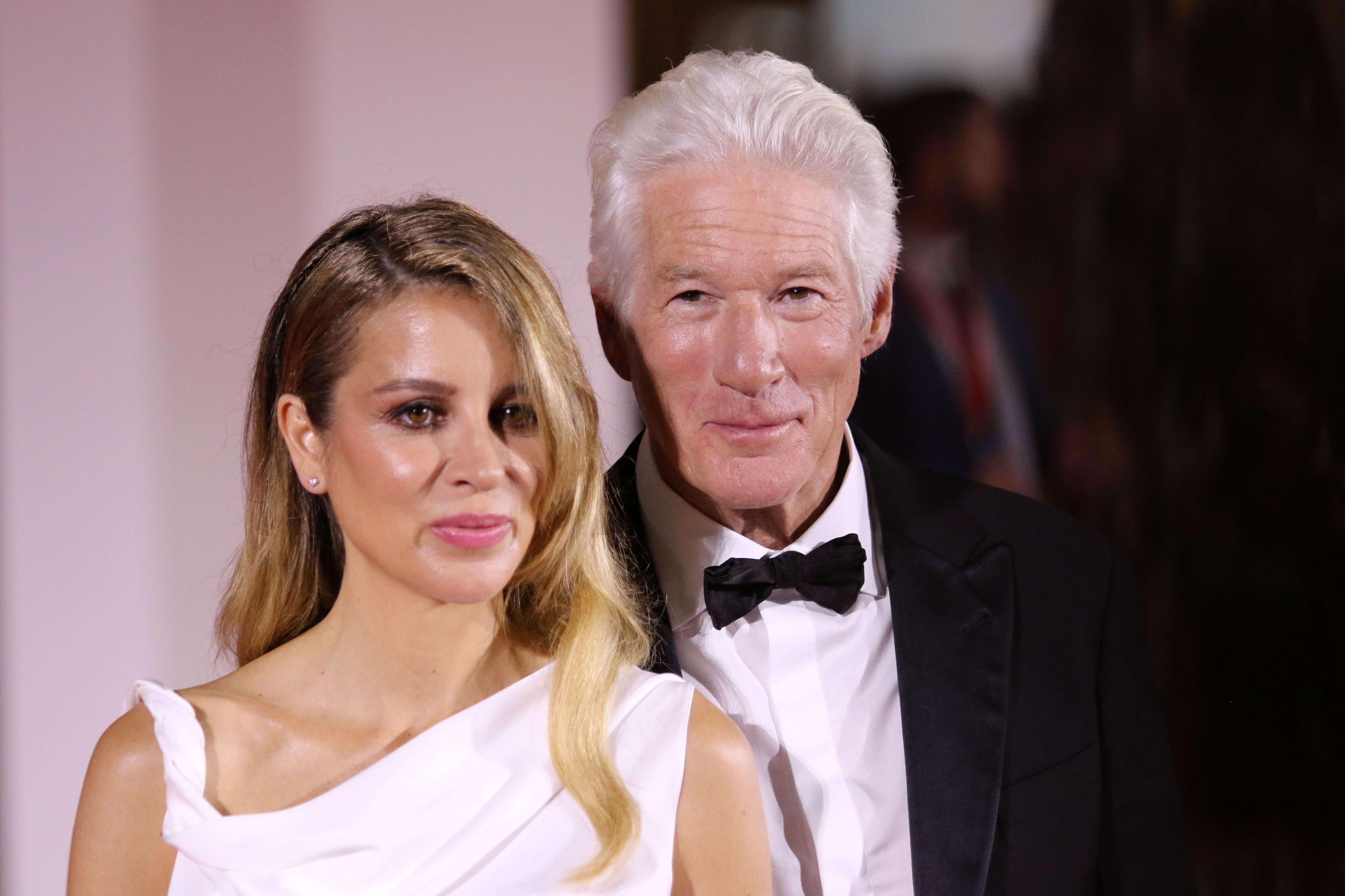 Richard Gere and Alejandra Silva attend the Filming Italy Venice Award red carpet during the 81th Venice International Film Festival