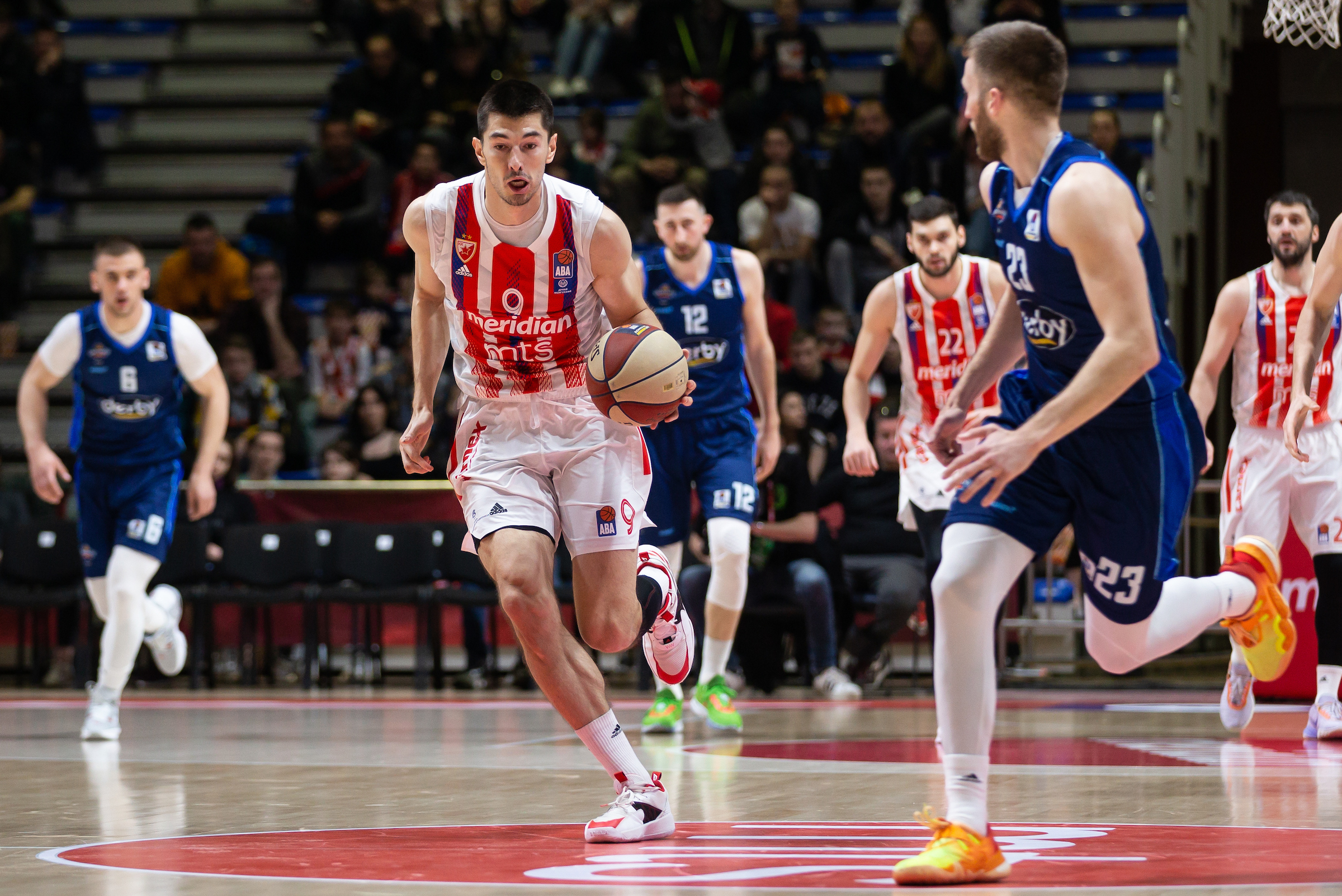 Luka Mitrovic (L) and Mateo Dreznjak (R) during the 2022/2023 Aba League match between Crvena Zvezda mts Belgrade and SC Derby at Aleksandar Nikolic Hall on March 19, 2023 in Belgrade, Serbia. (Photo by Srdjan Stevanovic/Starsport.rs ©)