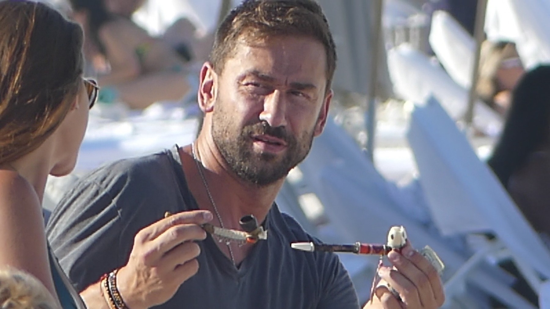 *EXCLUSIVE* Adriana Lima ex-husband Marko Jaric buys a smoking pipe while on the beach with a Stunning Brunette