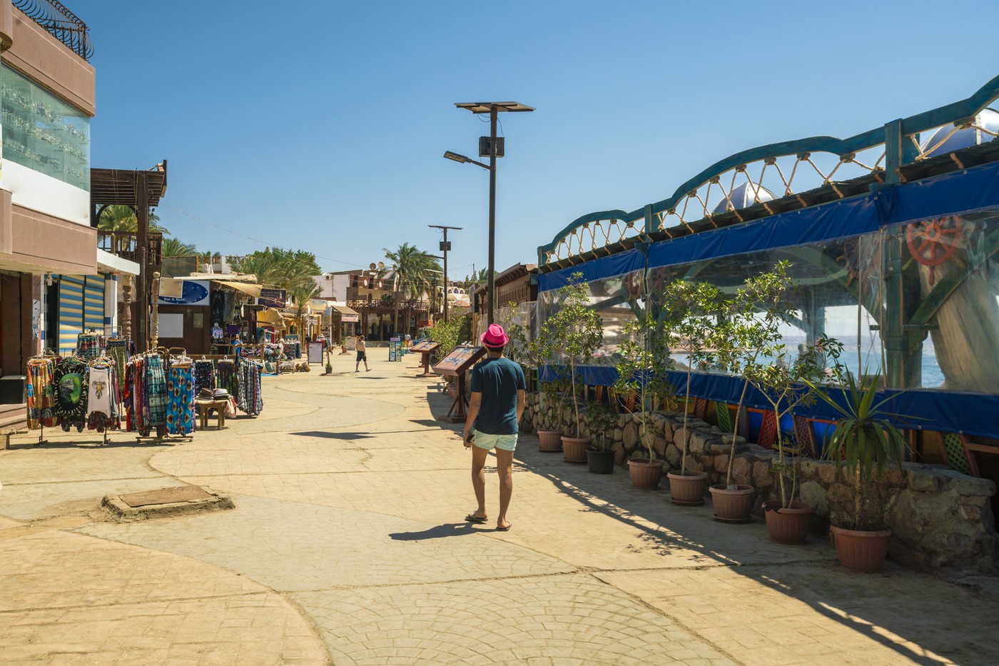 Egypt, Sinai, Tourists walking through town