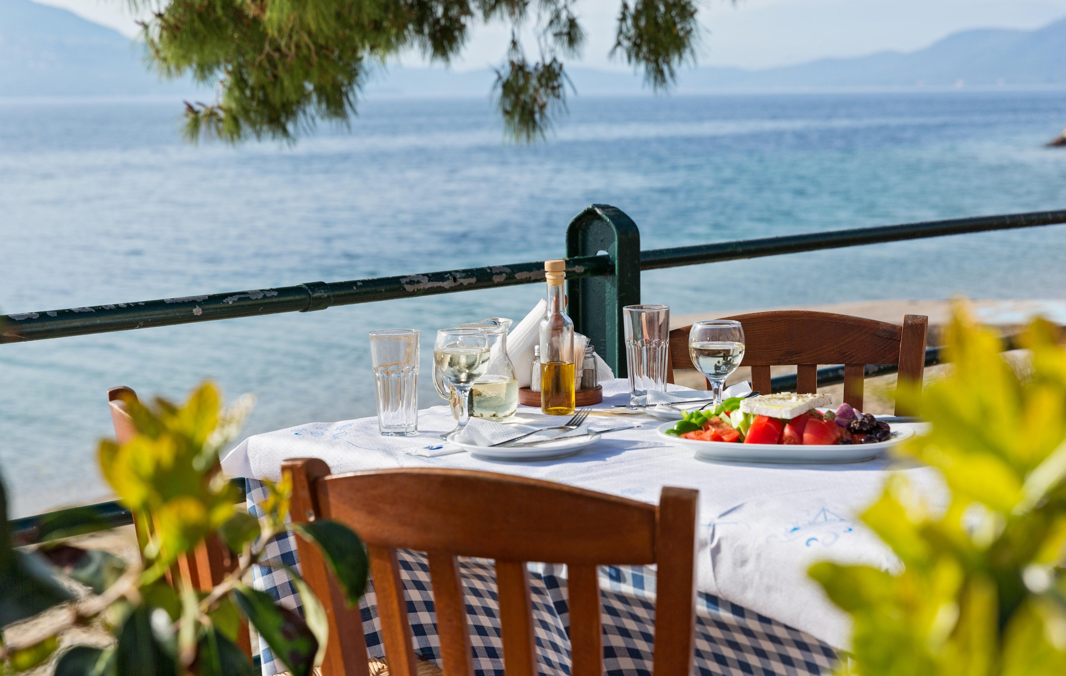 Lunch in a restaurant overlooking the sea, Greece, Santorini
