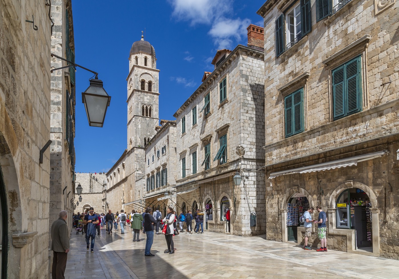 Visitors on Stradun and Franciscan Church and Monastery, Dubrovnik Old Town, UNESCO World Heritage Site, Dubrovnik, Dalmatia, Croatia