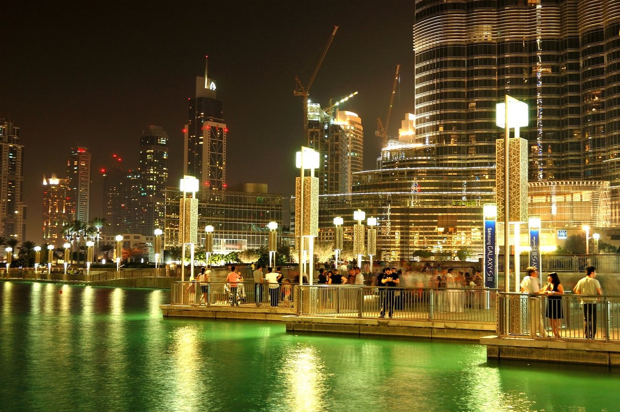 The area with tourist near Burj Khalifa. It is the world's tallest skyscraper (height 828m, 160 floors), Dubai, UAE