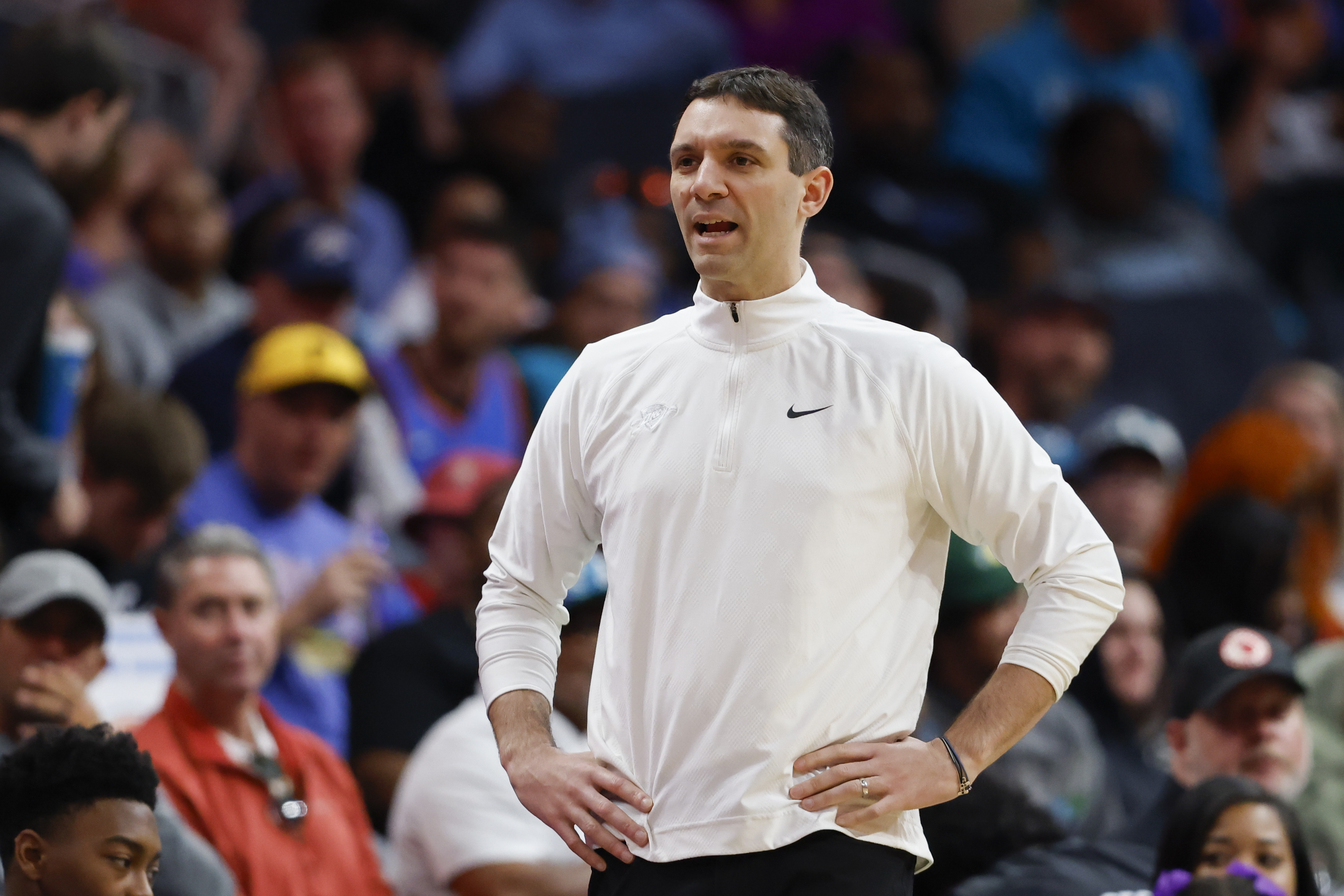 Oklahoma City Thunder head coach Mark Daigneault watches as his team plays against the Charlotte Hornets during the second half of an NBA basketball game in Charlotte, N.C., Sunday, April 7, 2024. (AP Photo/Nell Redmond)