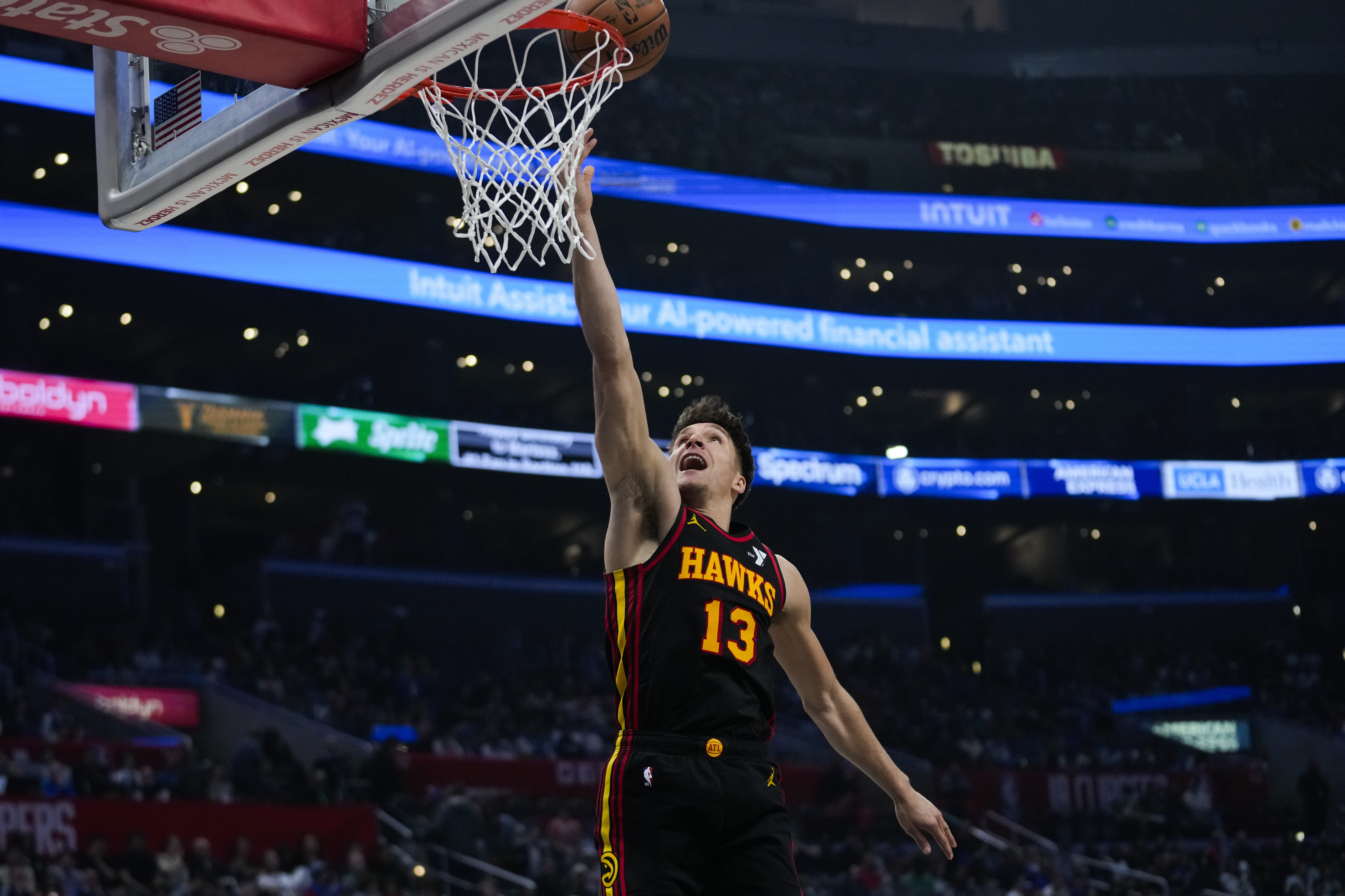 Atlanta Hawks guard Bogdan Bogdanovic shoots during the first half of an NBA basketball game against the Los Angeles Clippers in Los Angeles, Sunday, March 17, 2024. (AP Photo/Ashley Landis)