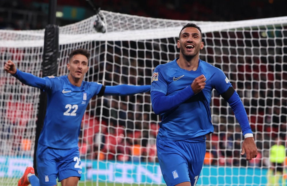 epa11653566 Vangelis Pavlidis of Greece (R) reacts after scoring his teams second goal during the UEFA Nations League match between England and Greece in London, Great Britain, 10 October 2024.  EPA-EFE/ANDY RAIN