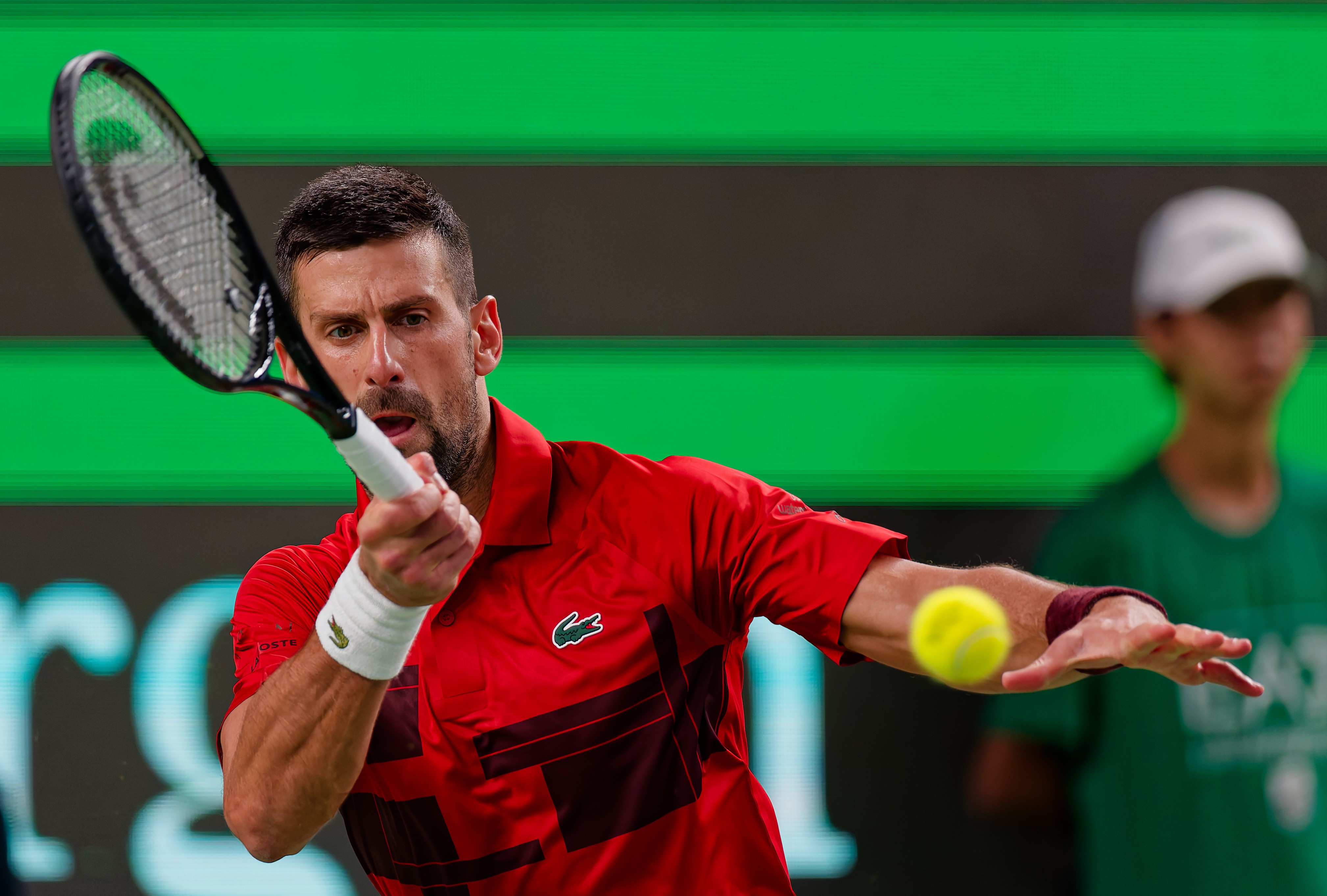 epa11648999 Novak Djokovic of Serbia in action during his Men's Singles round of 32 match against Flavio Cobolli of Italy at the Shanghai Masters tennis tournament in Shanghai, China, 08 October 2024.  EPA-EFE/ALEX PLAVEVSKI
