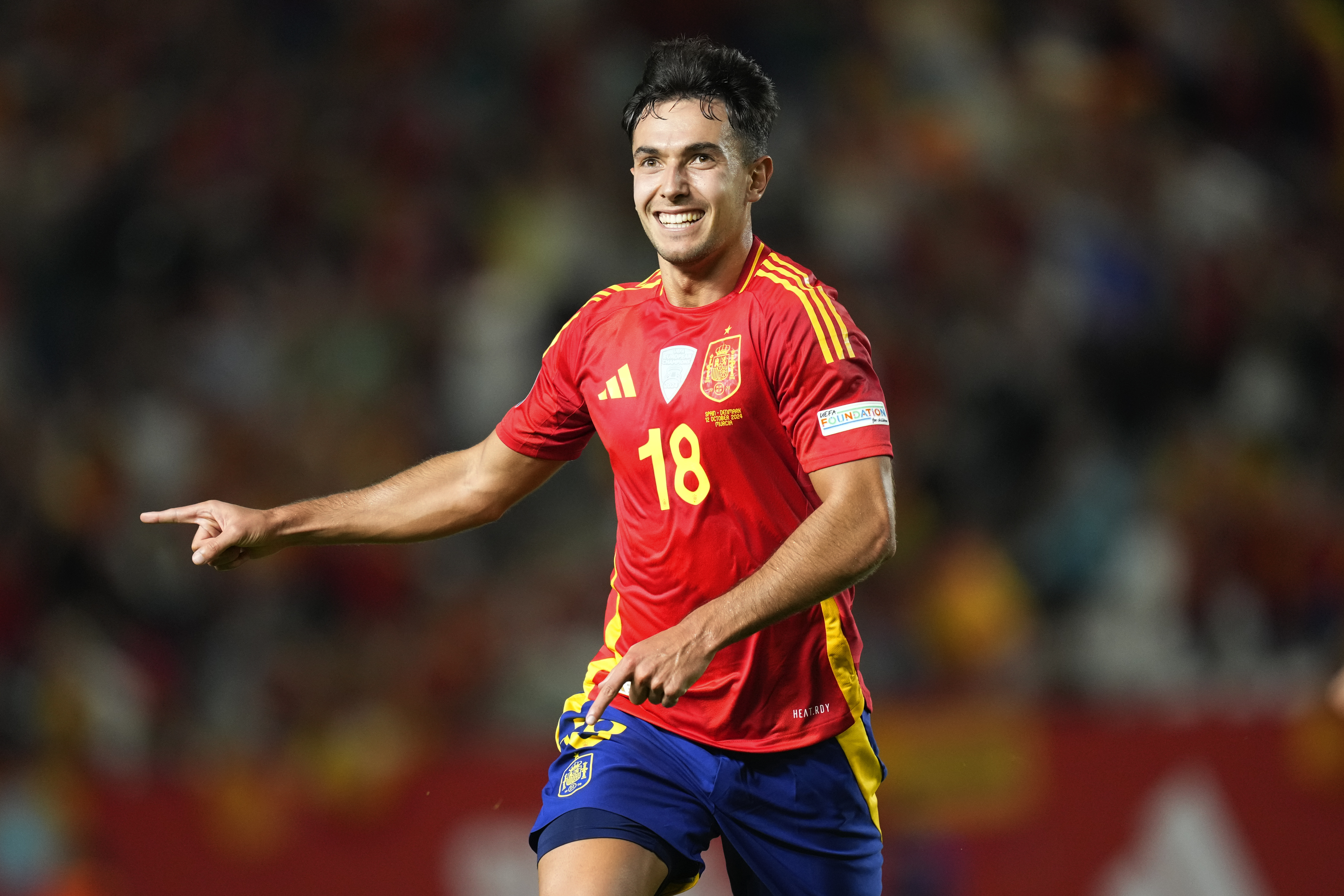 Spain's Martín Zubimendi celebrates after scoring the opening goal during the UEFA Nations League group 4 soccer match between Spain and Denmark in Murcia, Spain, Saturday, Oct. 12, 2024. (AP Photo/Jose Breton)