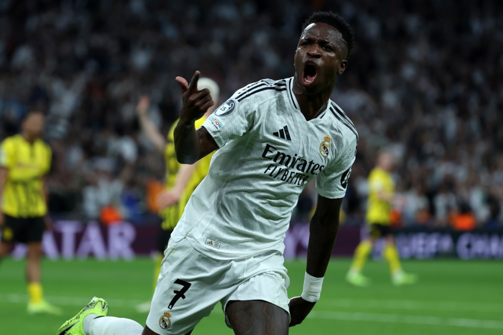 epa11676164 Real Madrid's Vinicius Junior celebrates after scoring the 2-2 goal during the UEFA Champions League soccer match between Real Madrid and Borussia Dortmund, in Madrid, Spain, 22 October 2024.  EPA-EFE/KIKO HUESCA