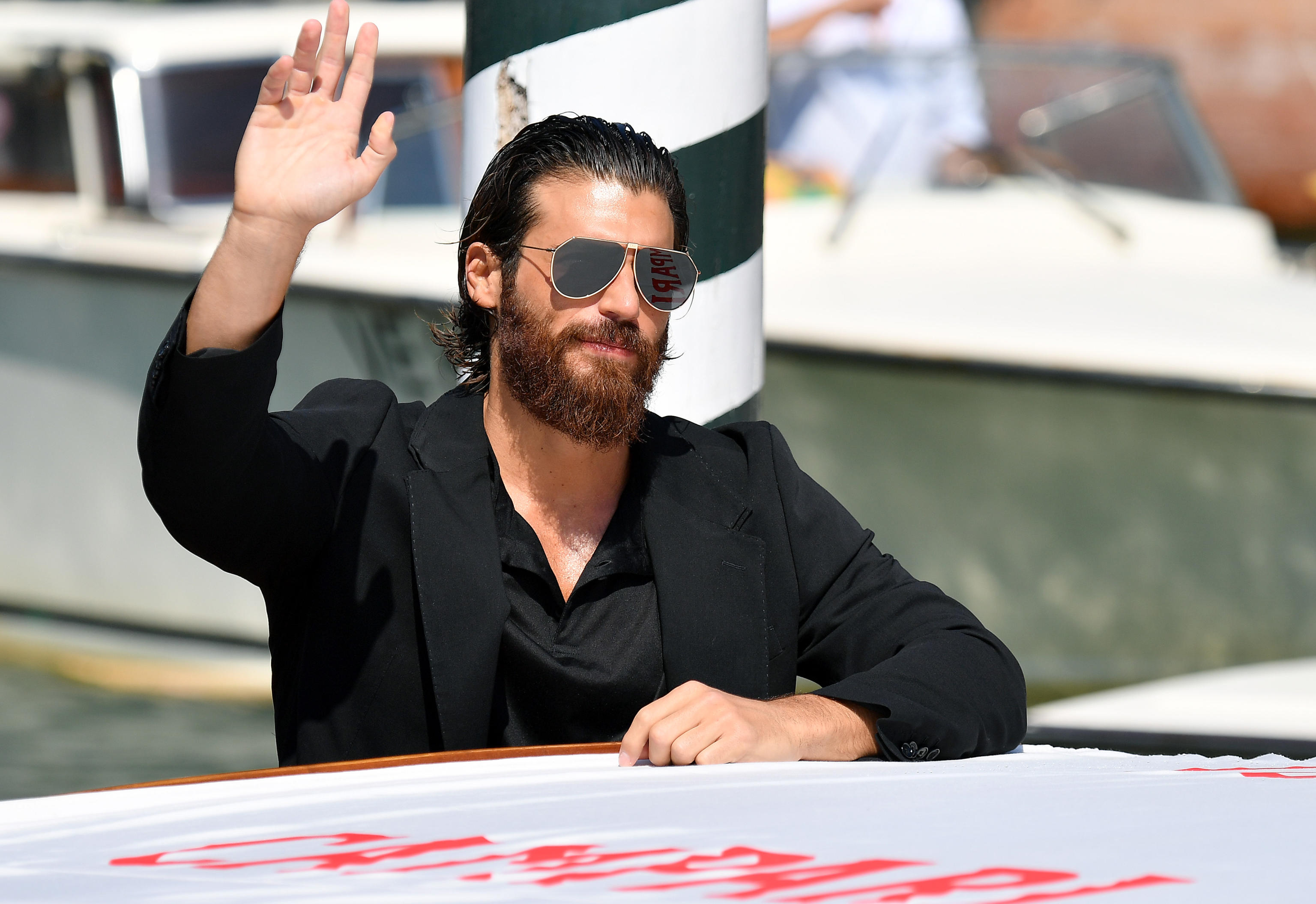 epa09448988 Turkish actor Can Yaman arrives at the Lido Beach for the 78th annual Venice International Film Festival, in Venice, Italy, 05 September 2021. The festival runs from 01 to 11 September 2021.  EPA-EFE/ETTORE FERRARI