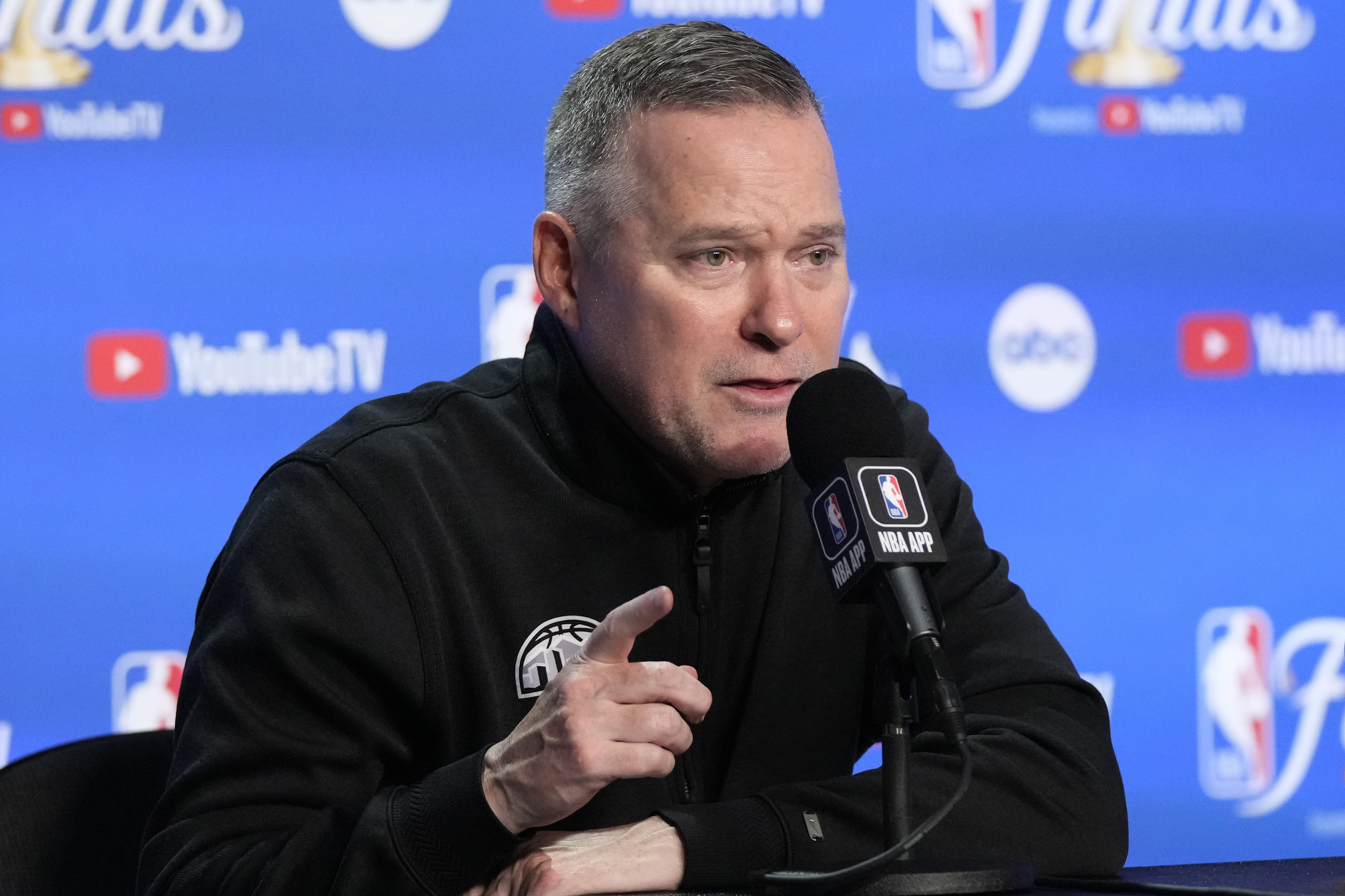 Denver Nuggets head coach Michael Malone speaks at a post-game news conference following Game 3 of the NBA Finals basketball game against the Miami Heat, Wednesday, June 7, 2023, in Miami. The Nuggets defeated the Heat 109-94. (AP Photo/Rebecca Blackwell)