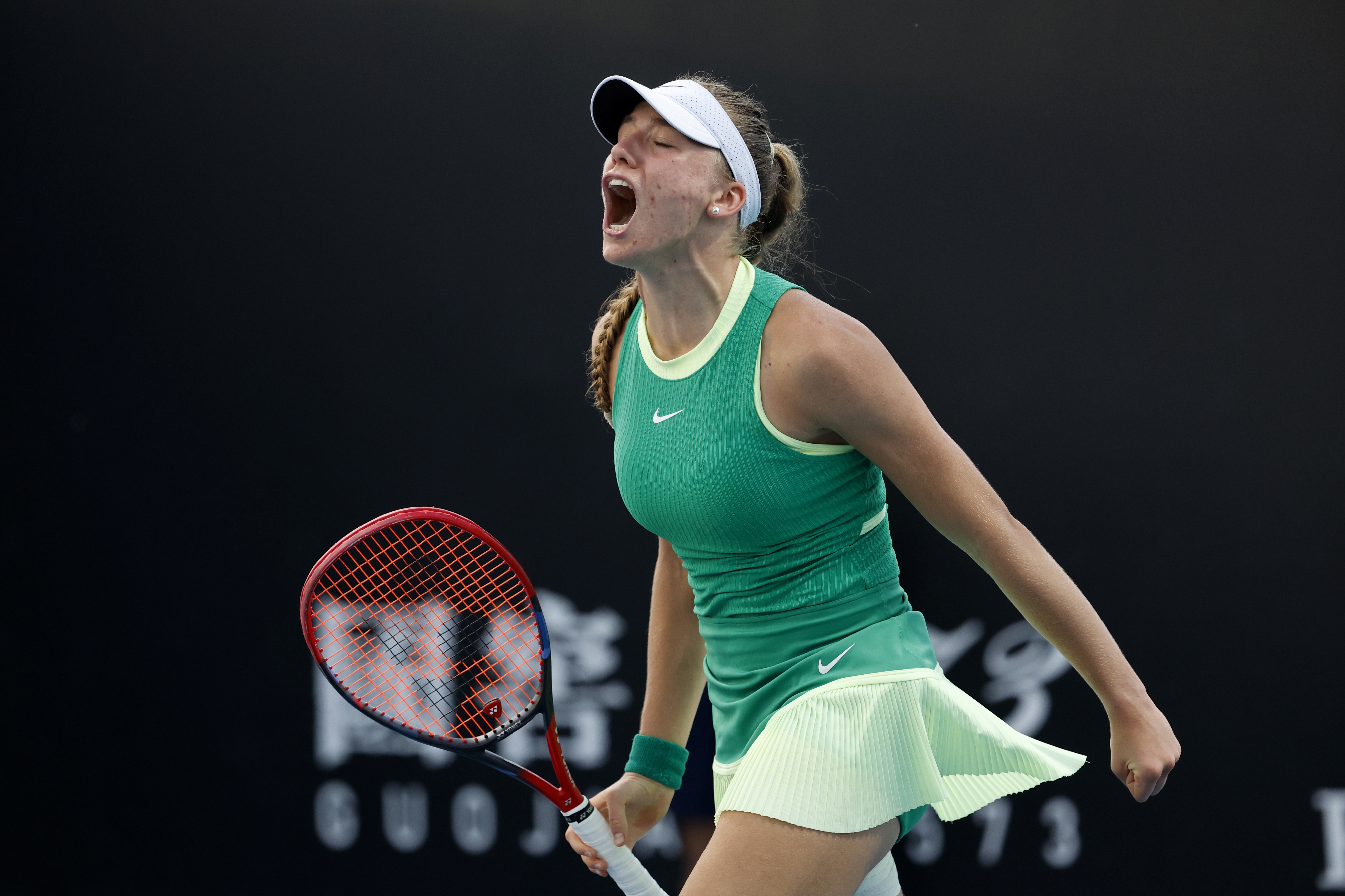 epa11075522 Alina Korneeva of Russia celebrates the match point during the Women's 1st round match against Sara Sorribes Tormo of Spain at the Australian Open tennis tournament in Melbourne, Australia, 14 January 2024.  EPA-EFE/MAST IRHAM