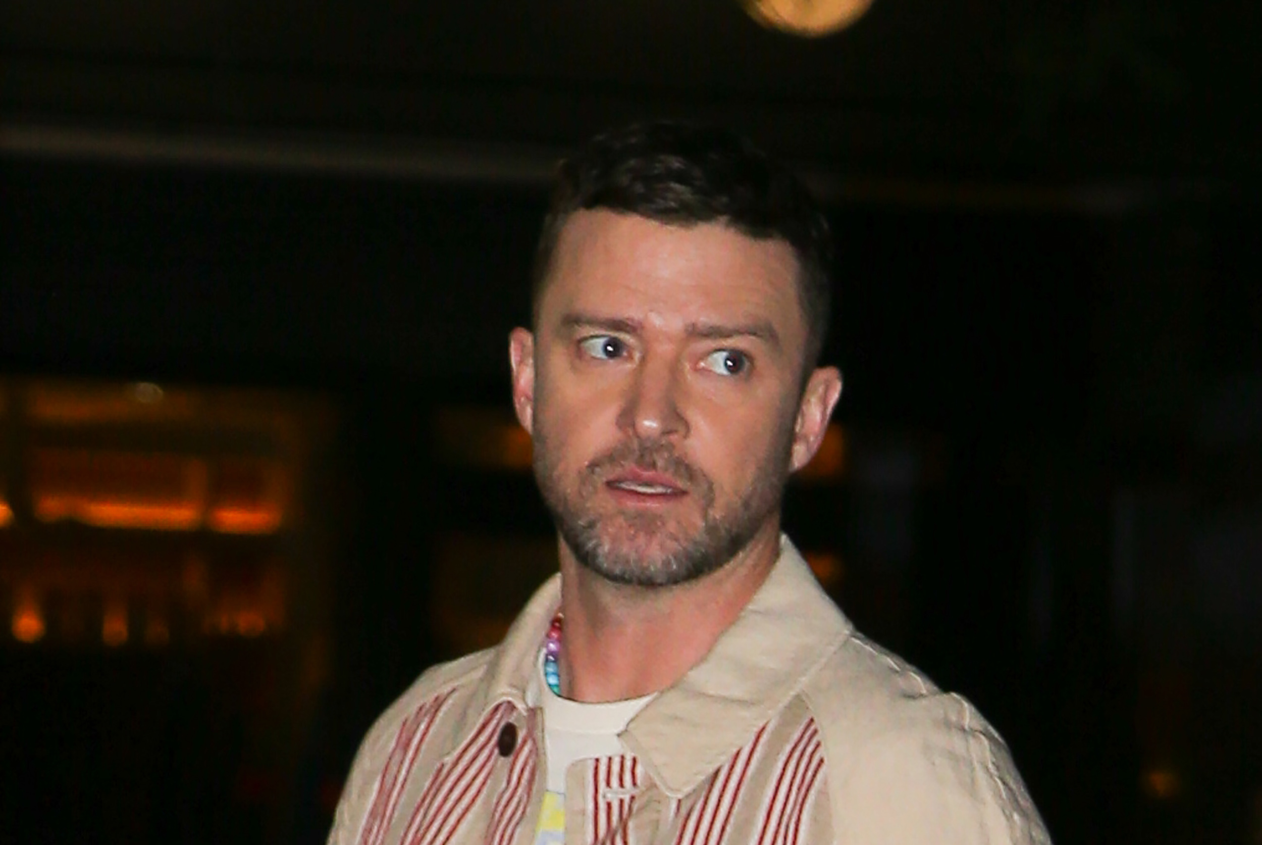 EXCLUSIVE: Justin Timberlake Seen Styling A Comme Des Garcons Jacket And White Valentino Sneakers For A Night Out In NYC