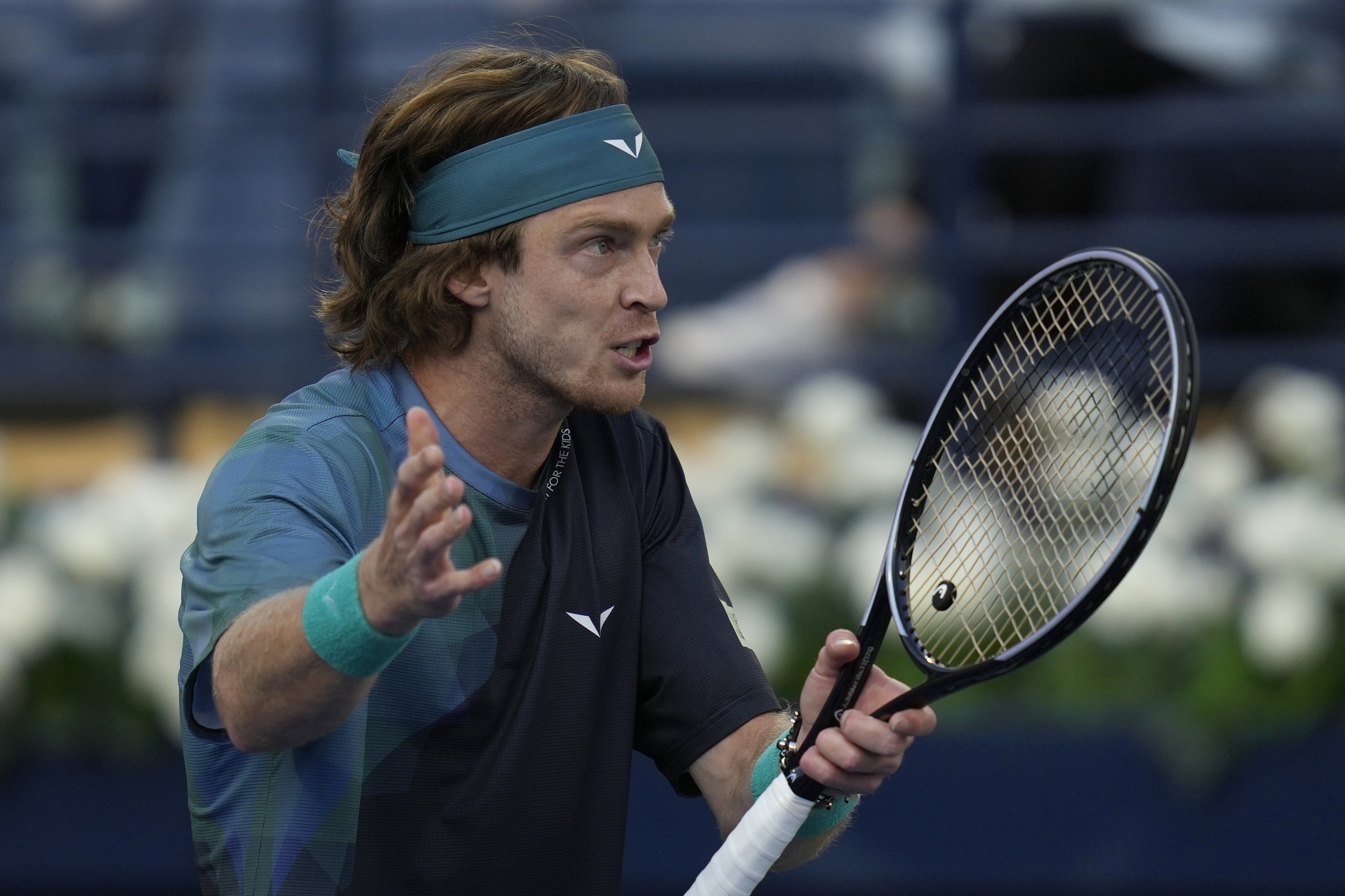 Andrey Rublev talks to chair umpire during a semi final match against Alexander Bublik of Kazakhstan at the Dubai Duty Free Tennis Championships in Dubai, United Arab Emirates, Friday, March 1, 2024. (AP Photo/Kamran Jebreili)