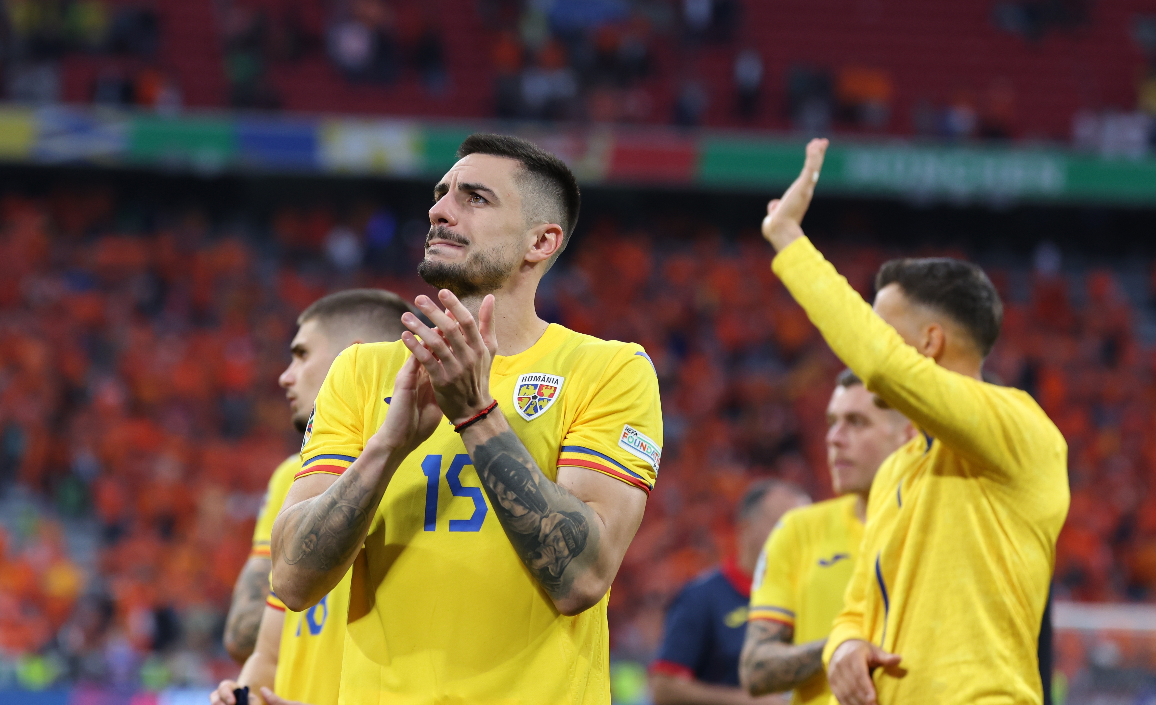 epa11453291 Andrei Burca of Romania applauds to supporters after losing the UEFA EURO 2024 Round of 16 soccer match between Romania and Netherlands, in Munich, Germany, 02 July 2024.  EPA-EFE/MOHAMED MESSARA