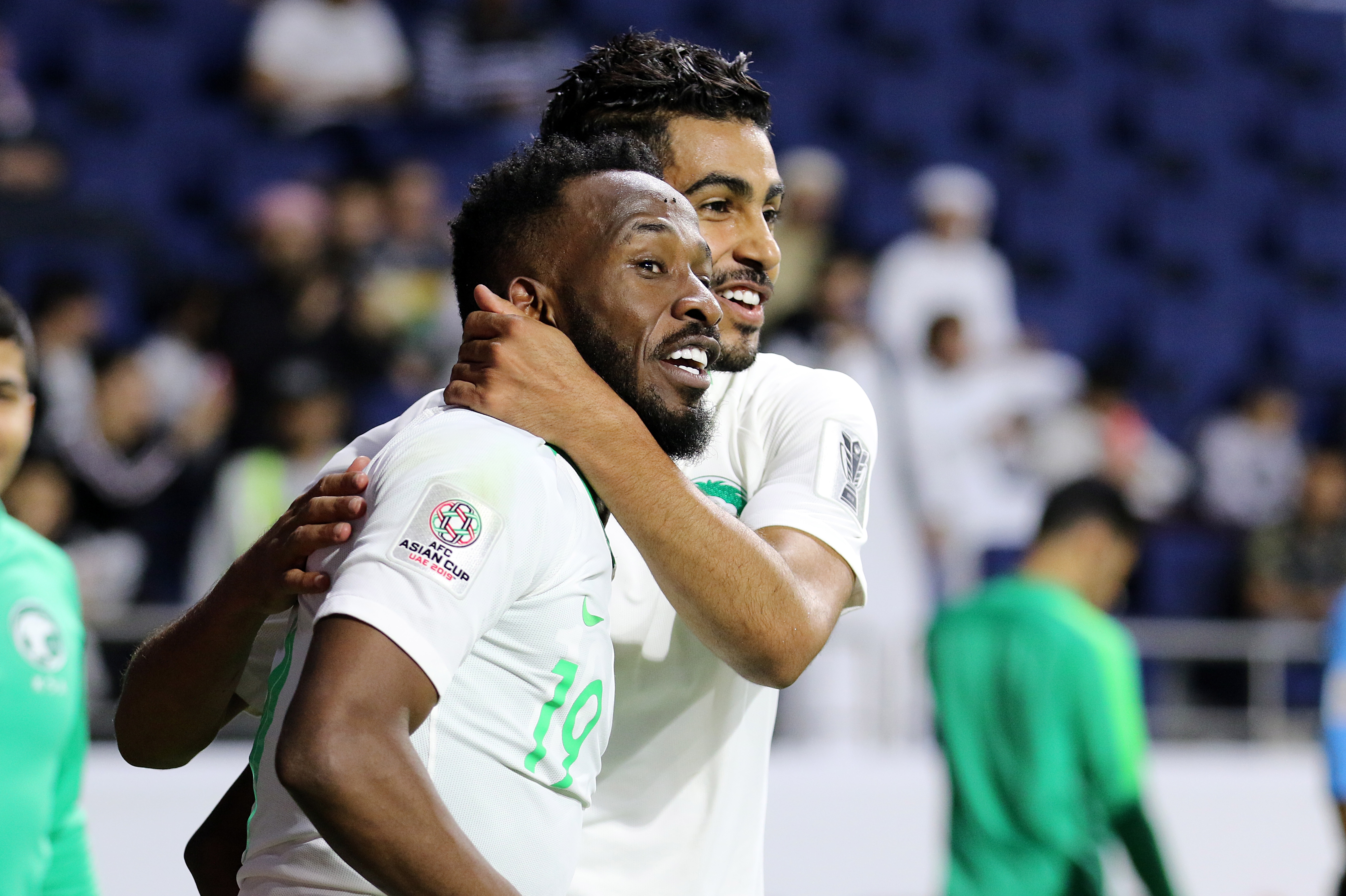 epa07278112 Fahad Al Muwallad (L) of Saudi Arabia celebrates scoring during the 2019 AFC Asian Cup group E soccer match between Lebanon and Saudi Arabia in Dubai, United Arab Emirates, 12 January 2019.  EPA-EFE/MAHMOUD KHALED